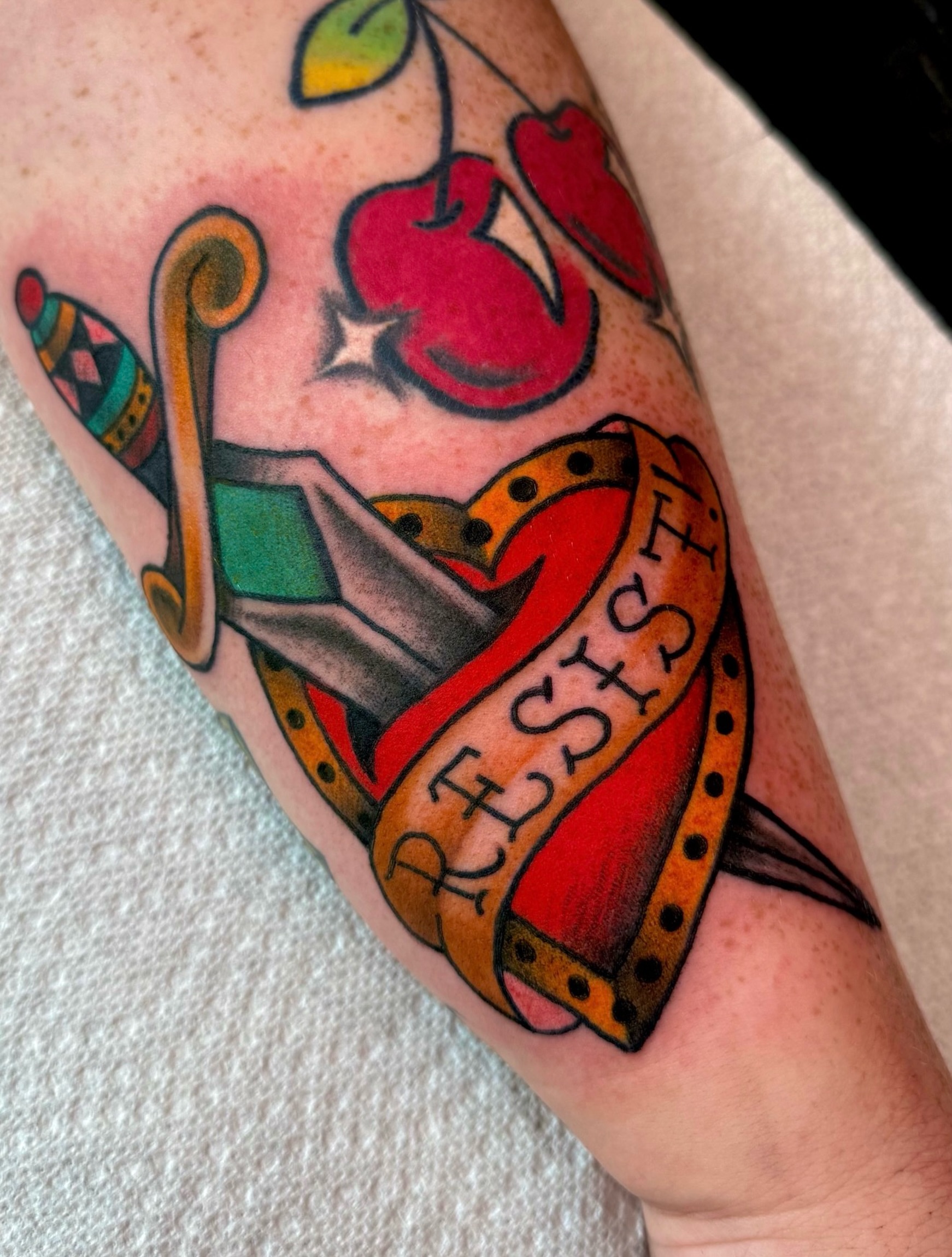 Resistance banner American traditional tattoo on the forearm by 🪩 Marisa Rae Mathews 🪩, McKees Rocks, Pennsylvania