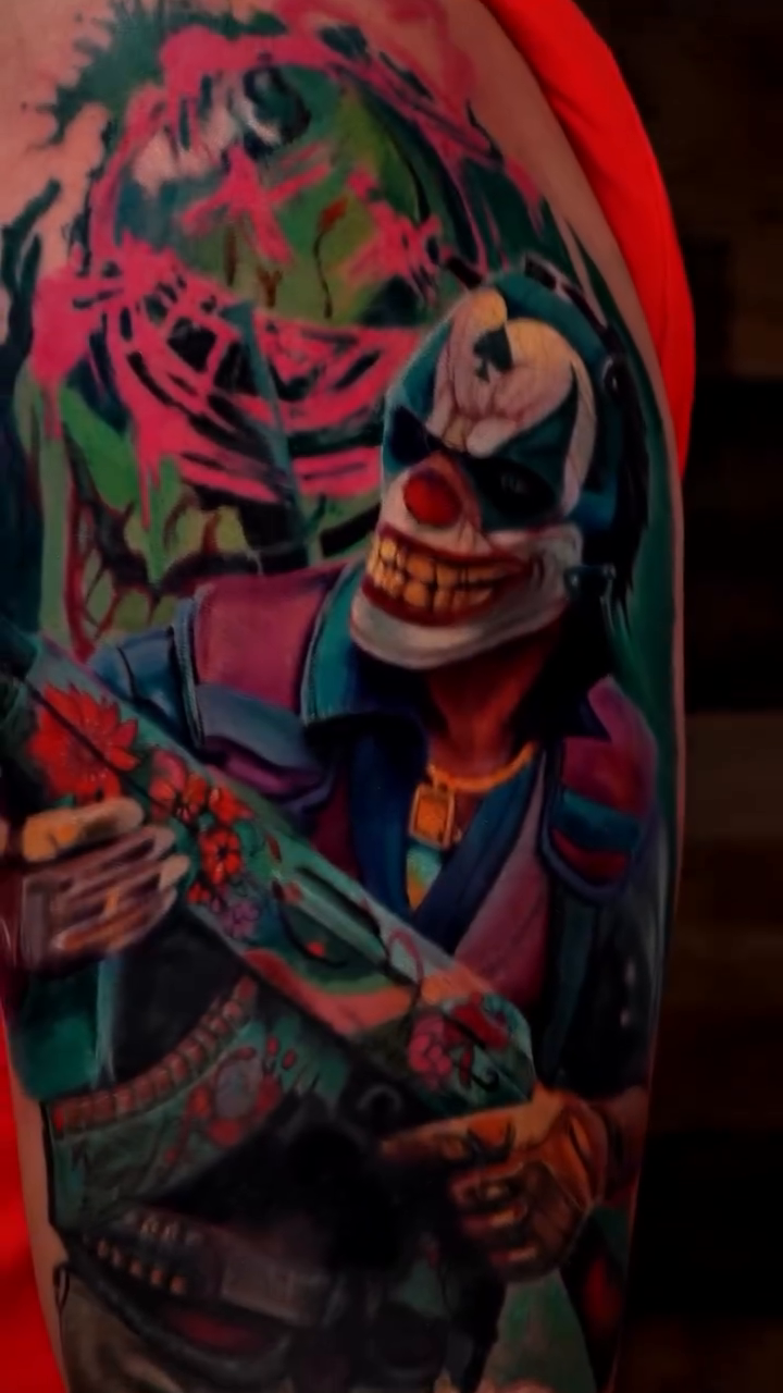 Clown with gun realism tattoo by Davier Del Castillo