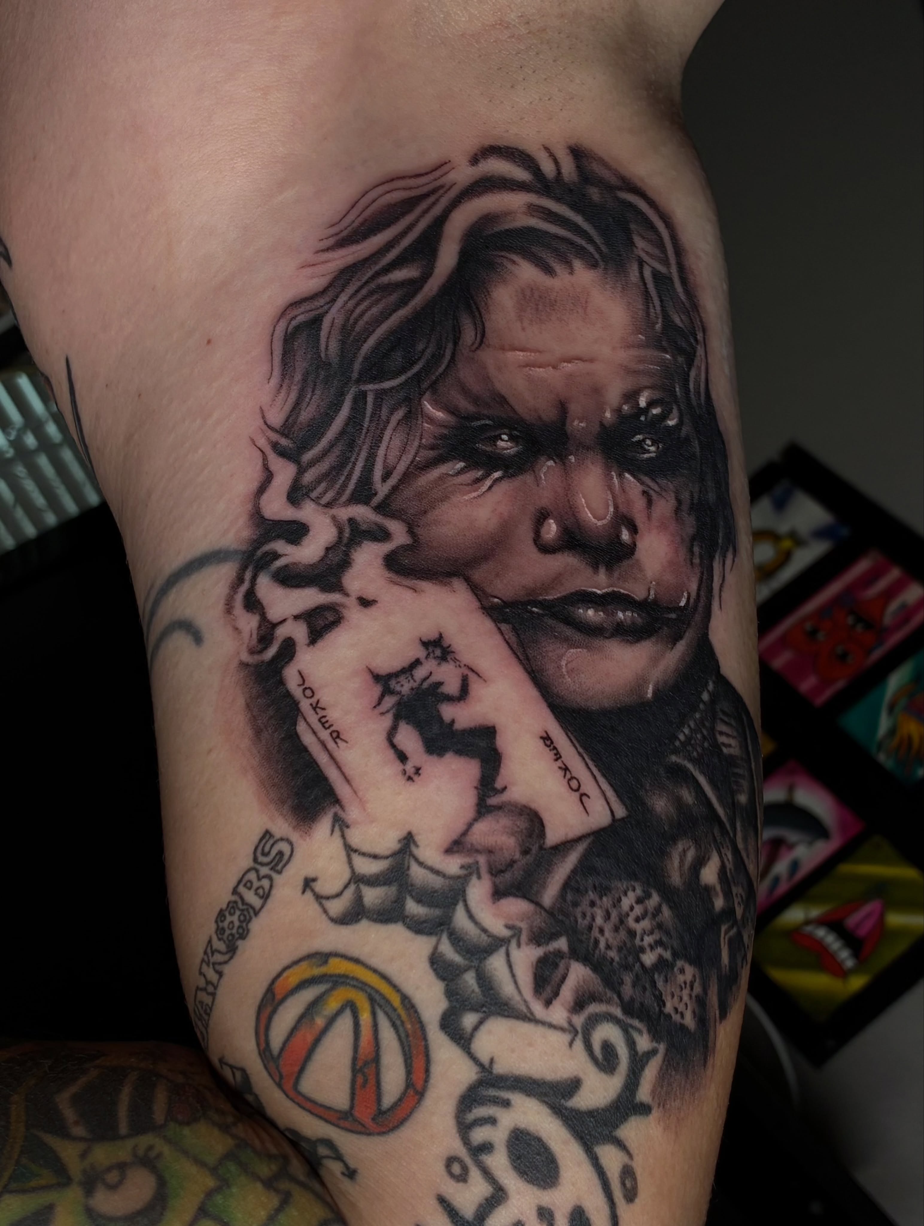 Portrait of a man realism tattoo on the forearm by Nessa, Las Vegas, Nevada