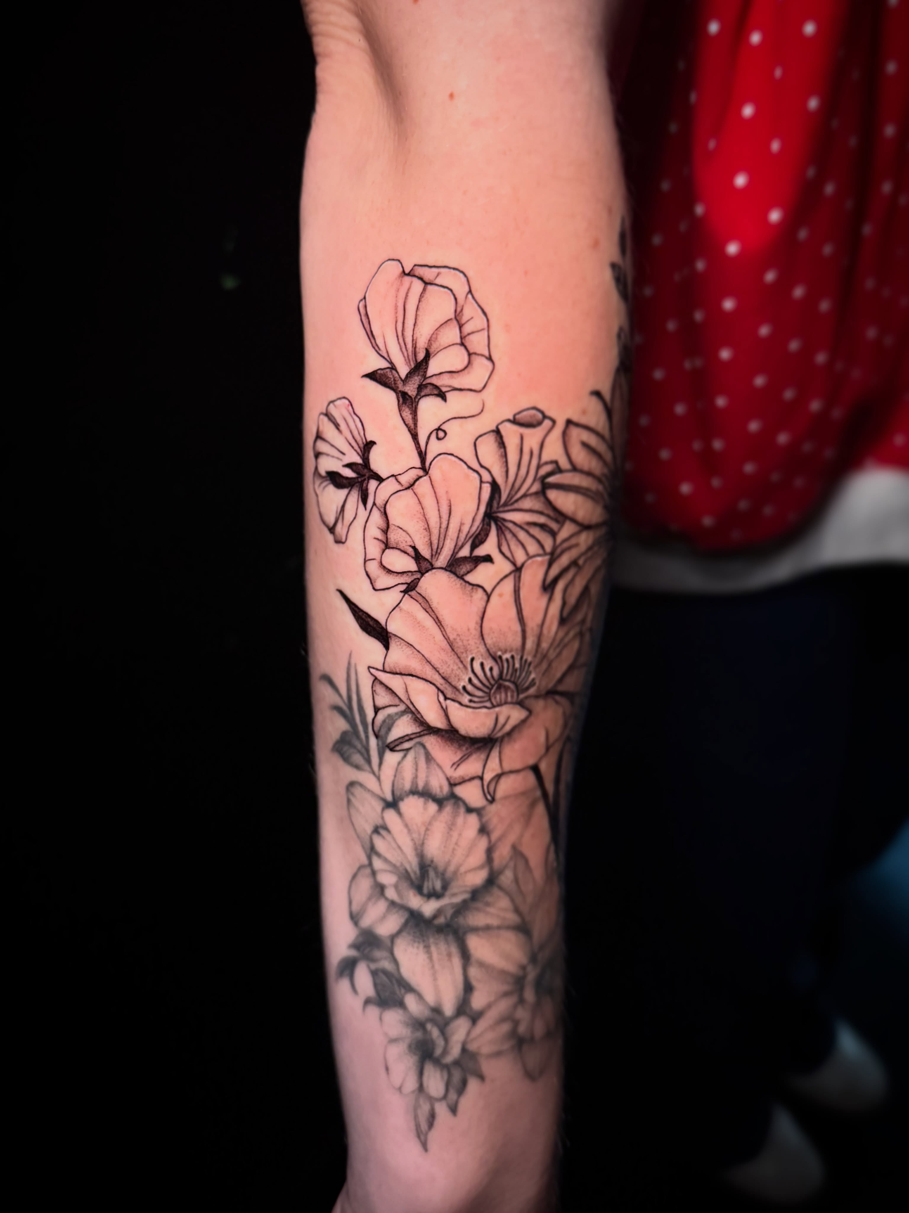 Flowers black and grey tattoo on the forearm by π΅ππππππ¦π€