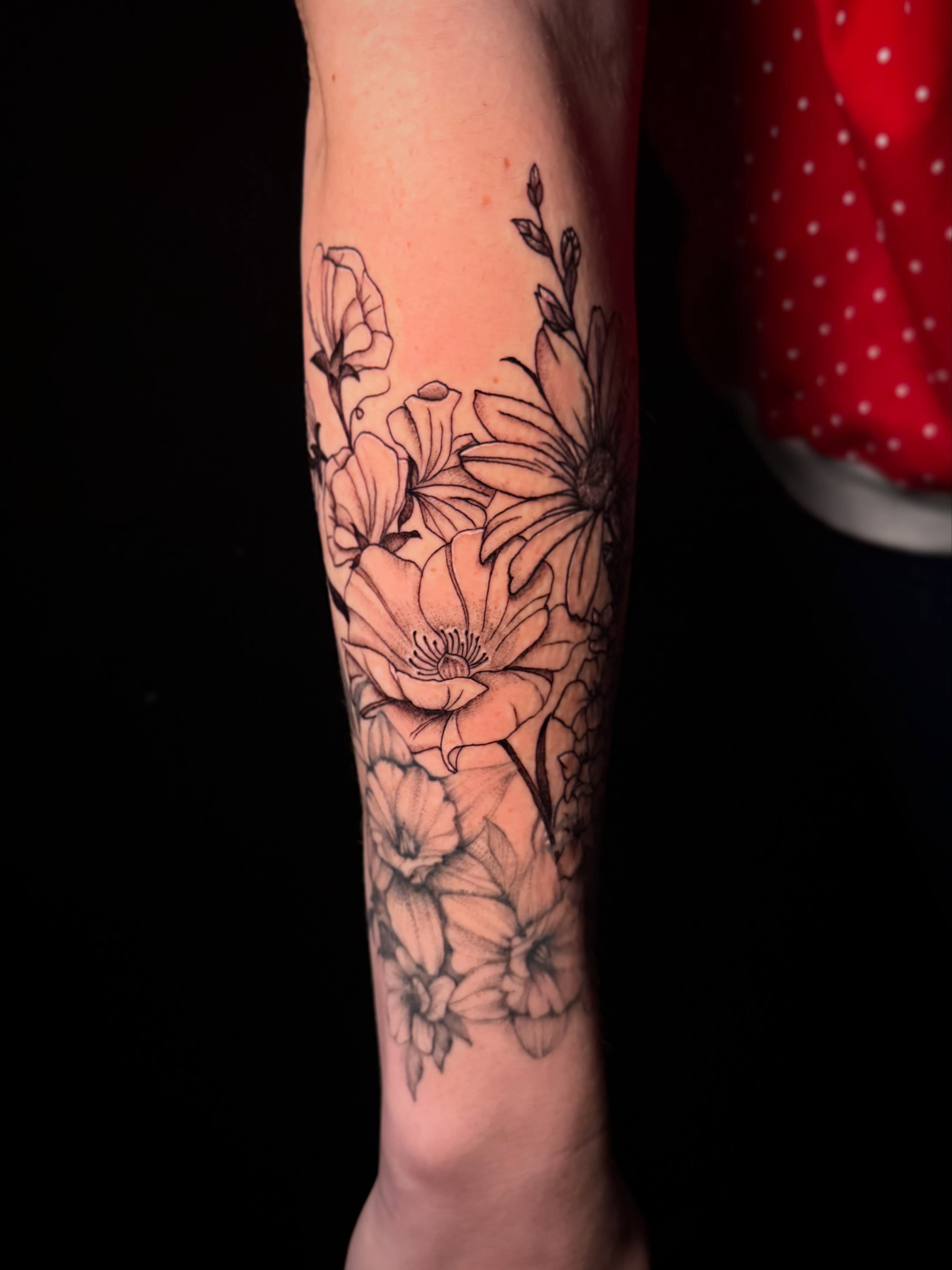 Floral bouquet black and grey tattoo on the forearm by π΅ππππππ¦π€