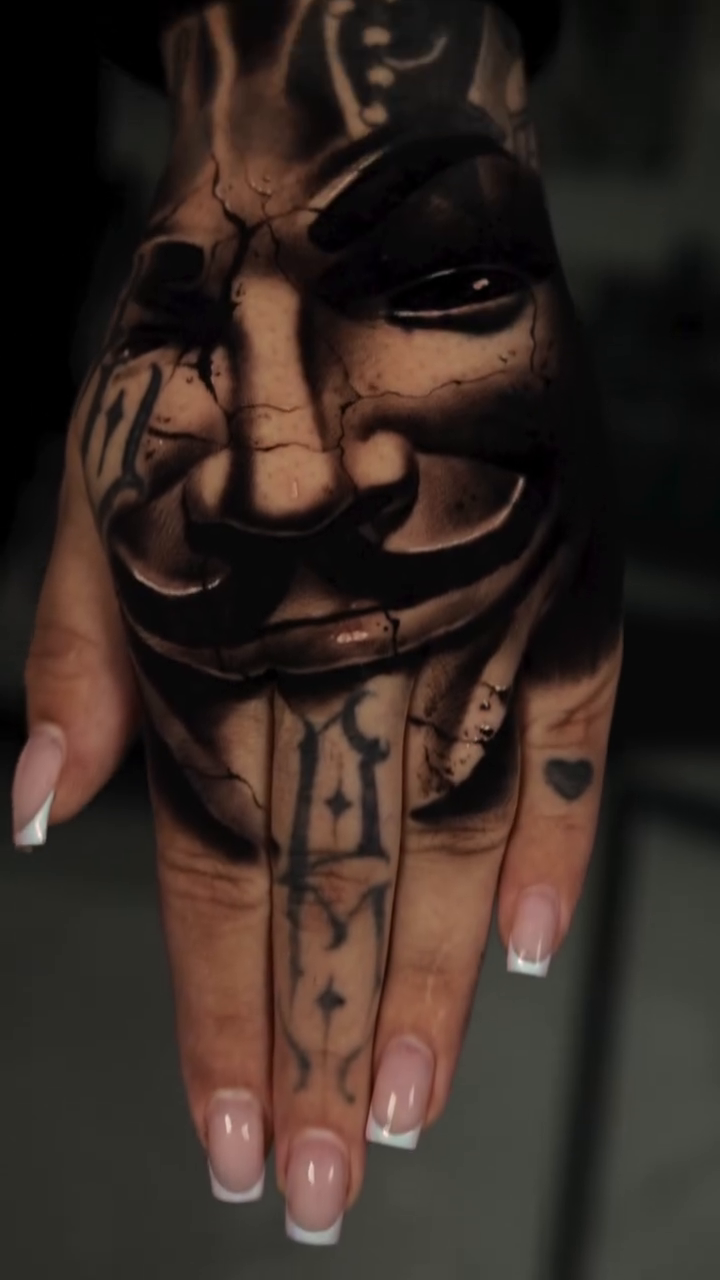 Guy Fawkes mask realism tattoo by Anthony Maya