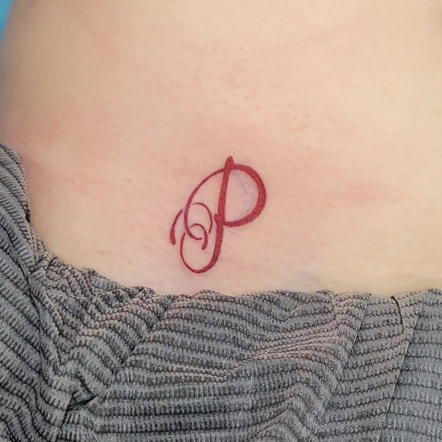 Script lettering lettering script tattoo on the chest by Sarah Alba