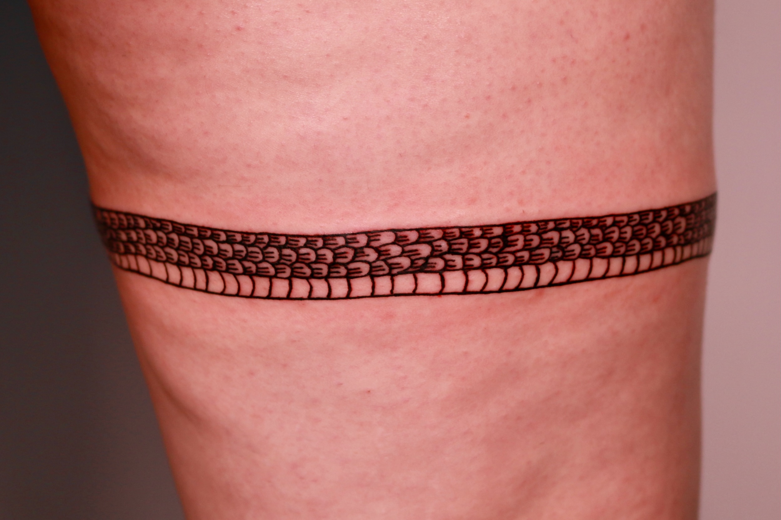 Geometric pattern geometric tattoo on the thigh by Mike