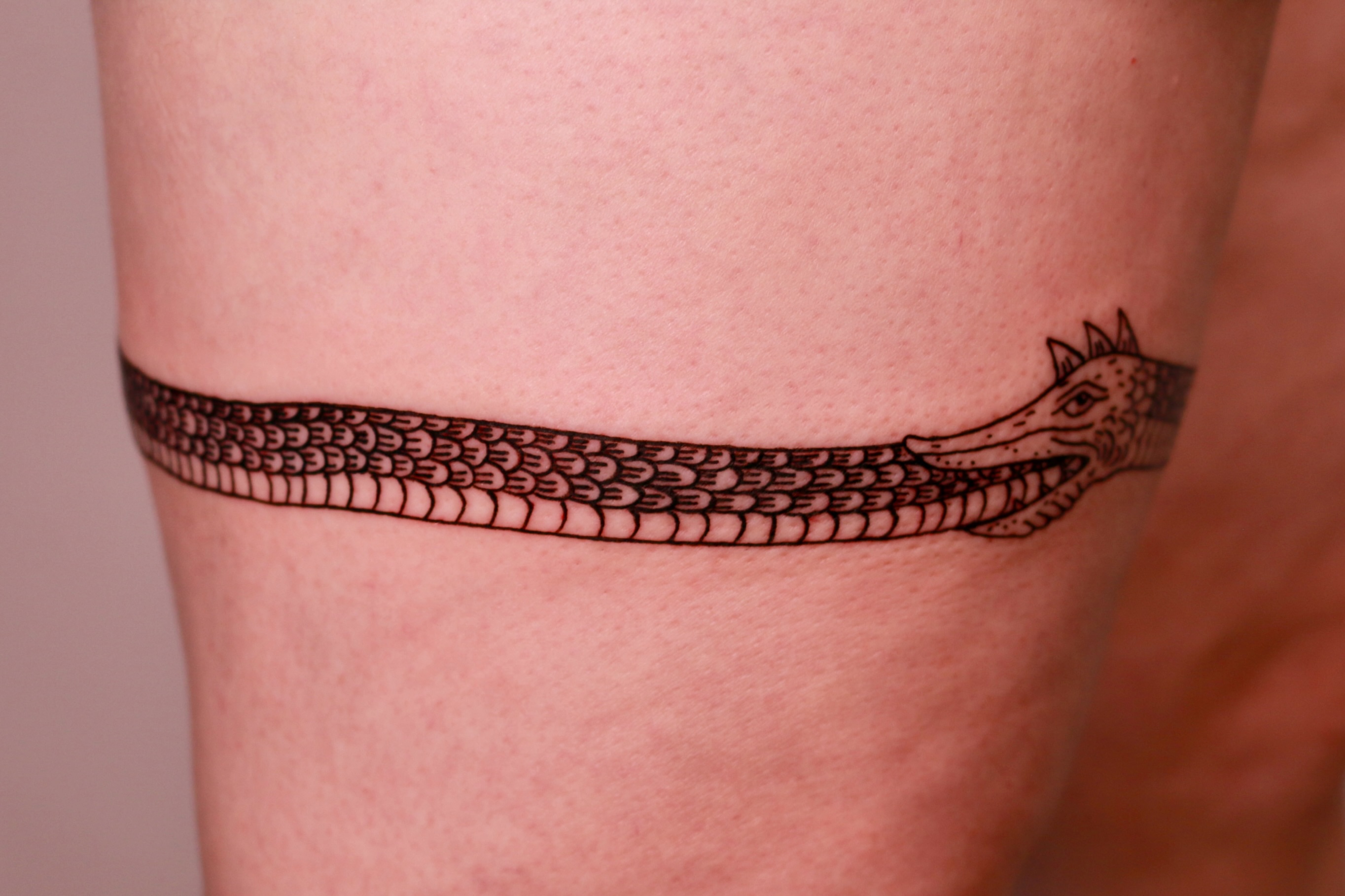 Crocodile black and grey tattoo on the leg by Mike