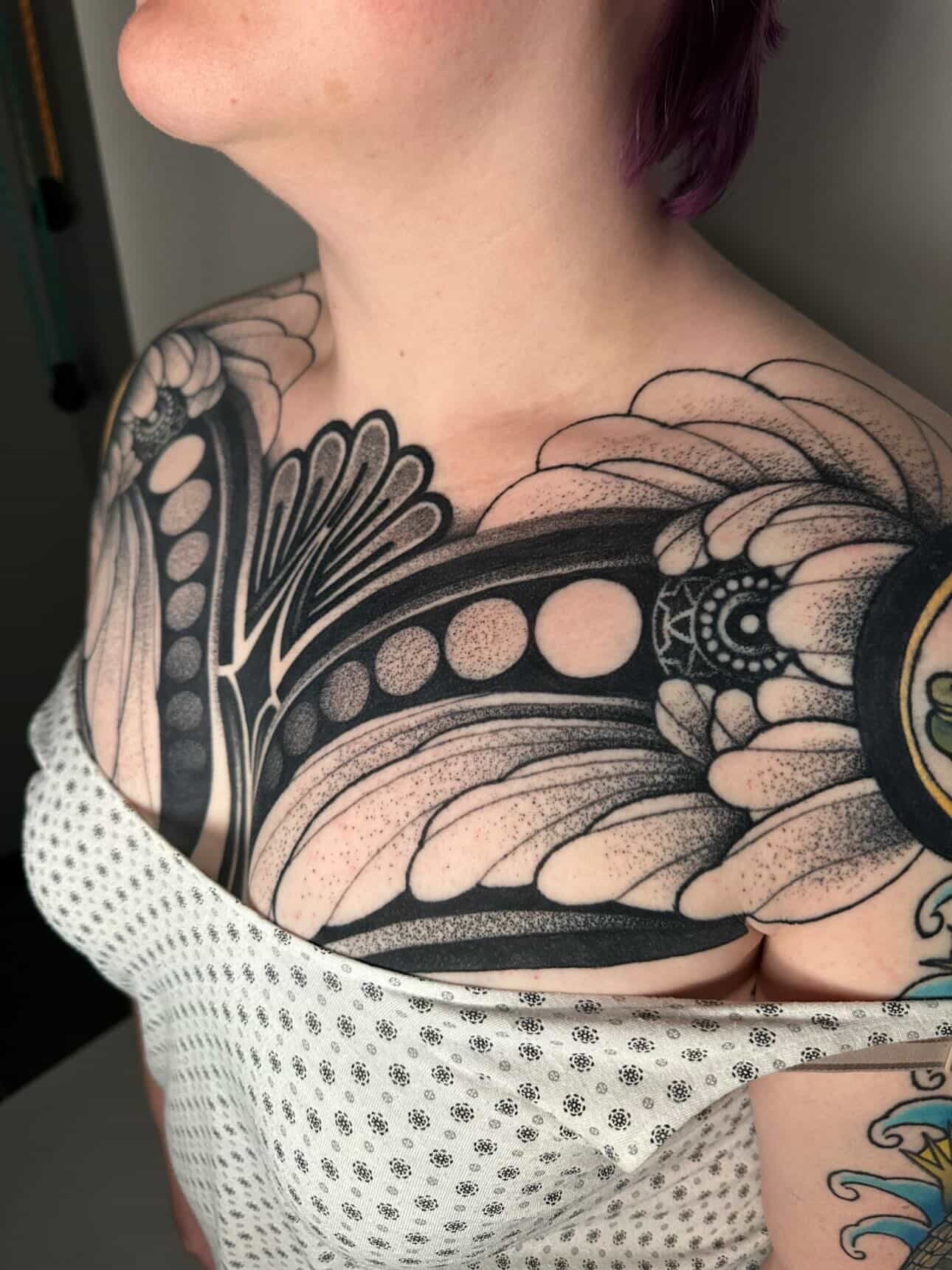Abstract floral design dotwork tattoo on the chest by Will Spencer