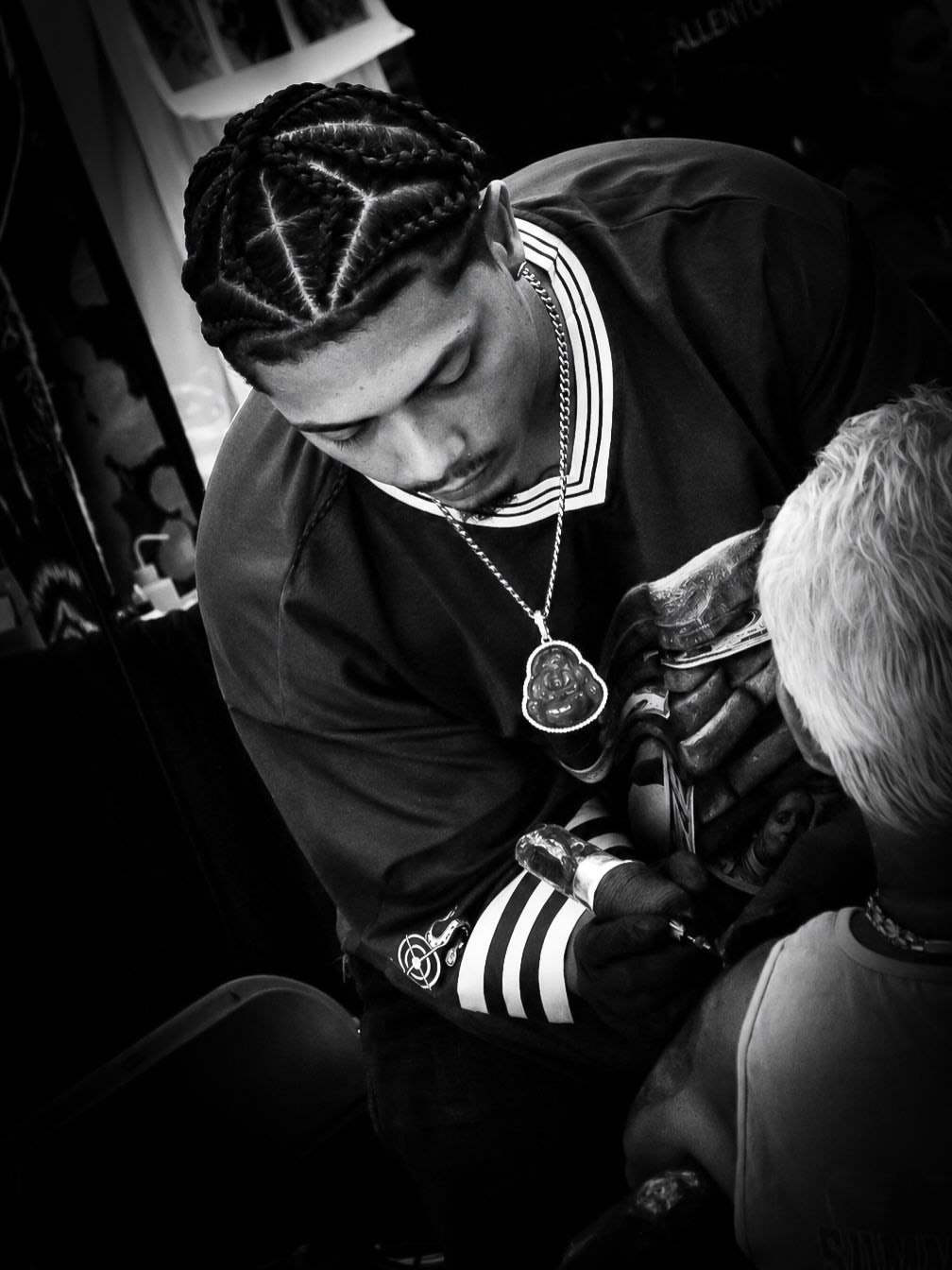 Tattoo artist black and grey tattoo on the upper arm by Therapy ink