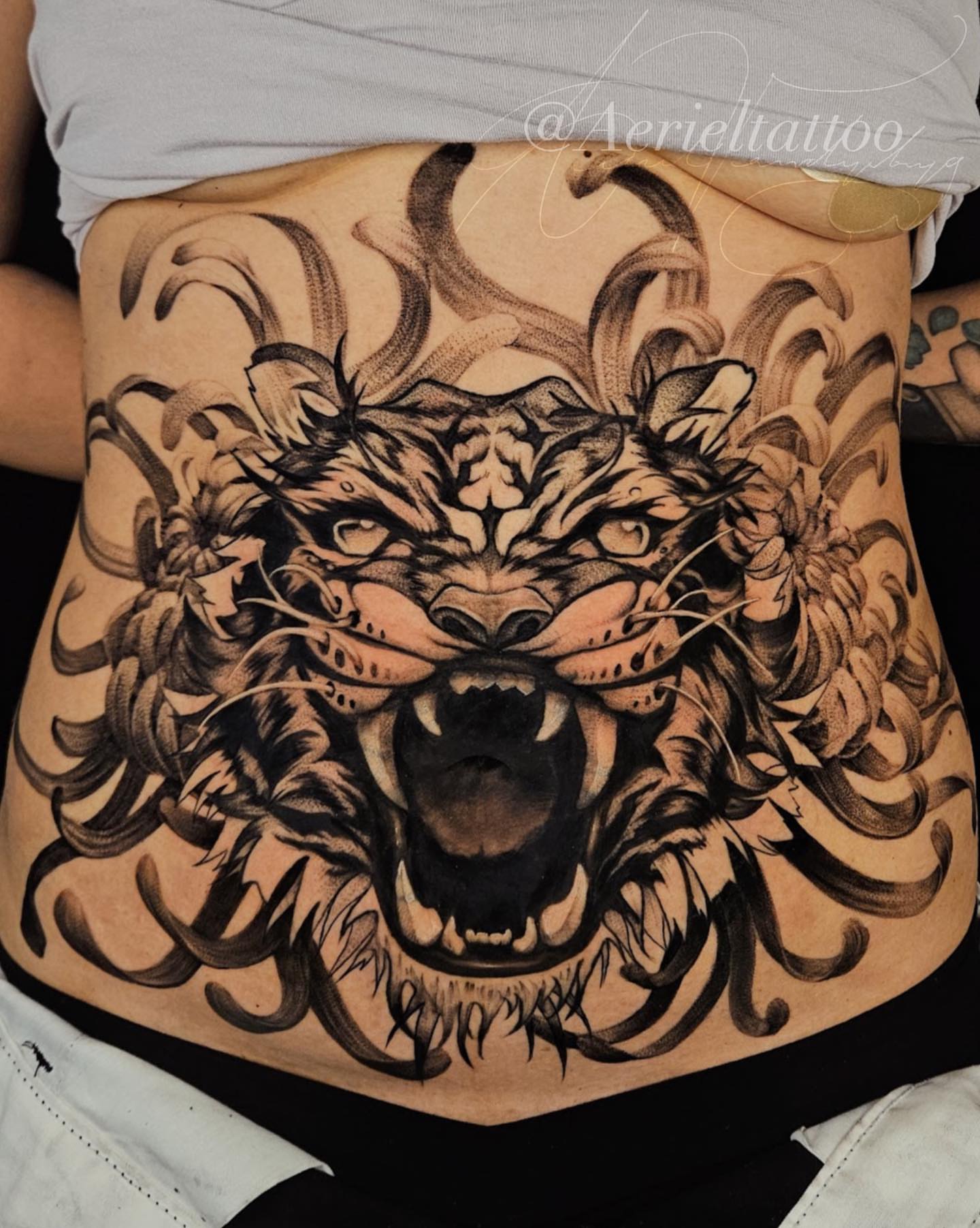 Tattoo by @aerieltattoo — black_and_grey, realism