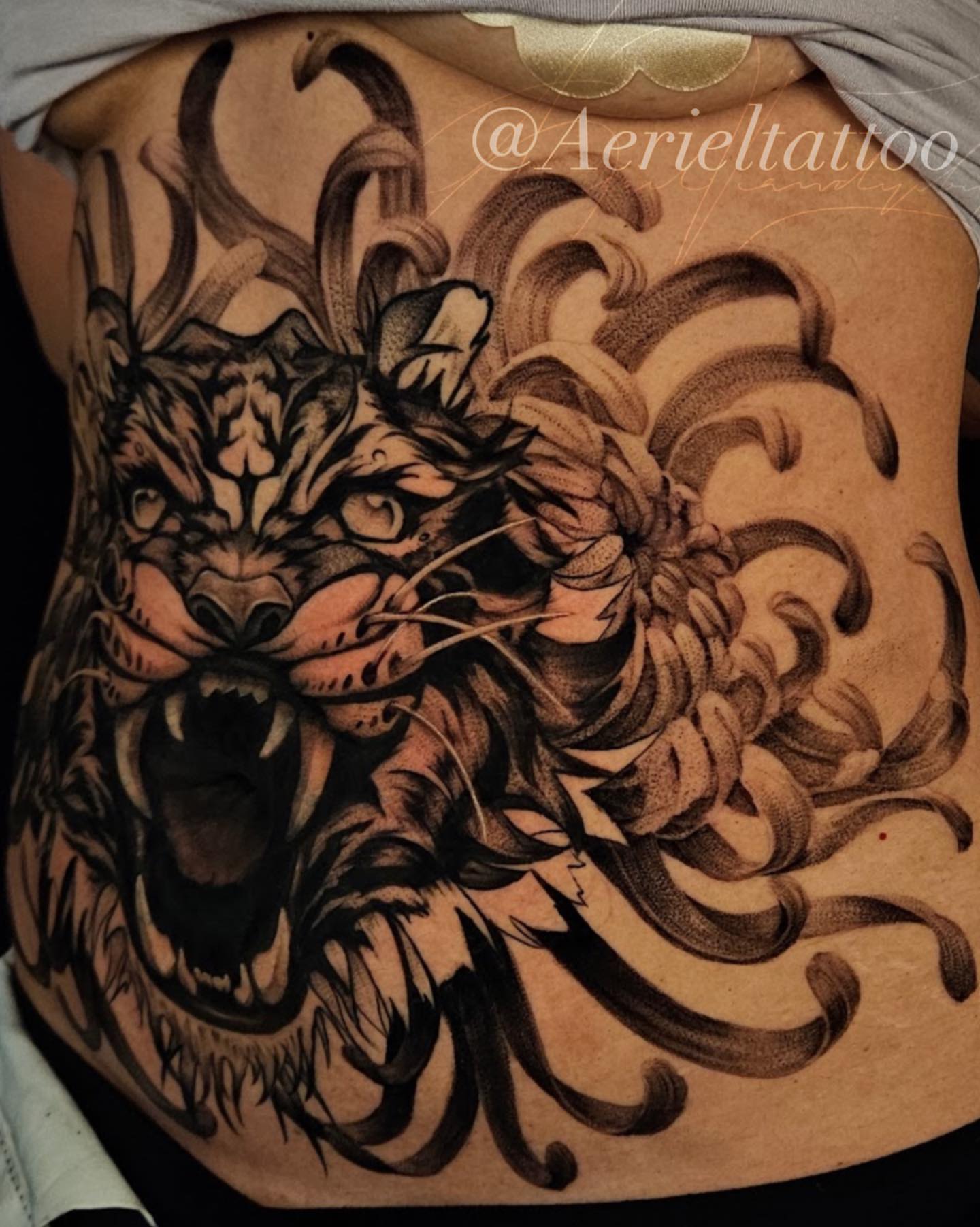 Tattoo by @aerieltattoo — black_and_grey, realism