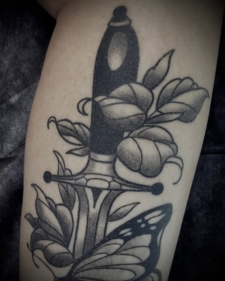 Knife and flowers black and grey tattoo on the forearm by Shelbie, Salt Lake City, Utah