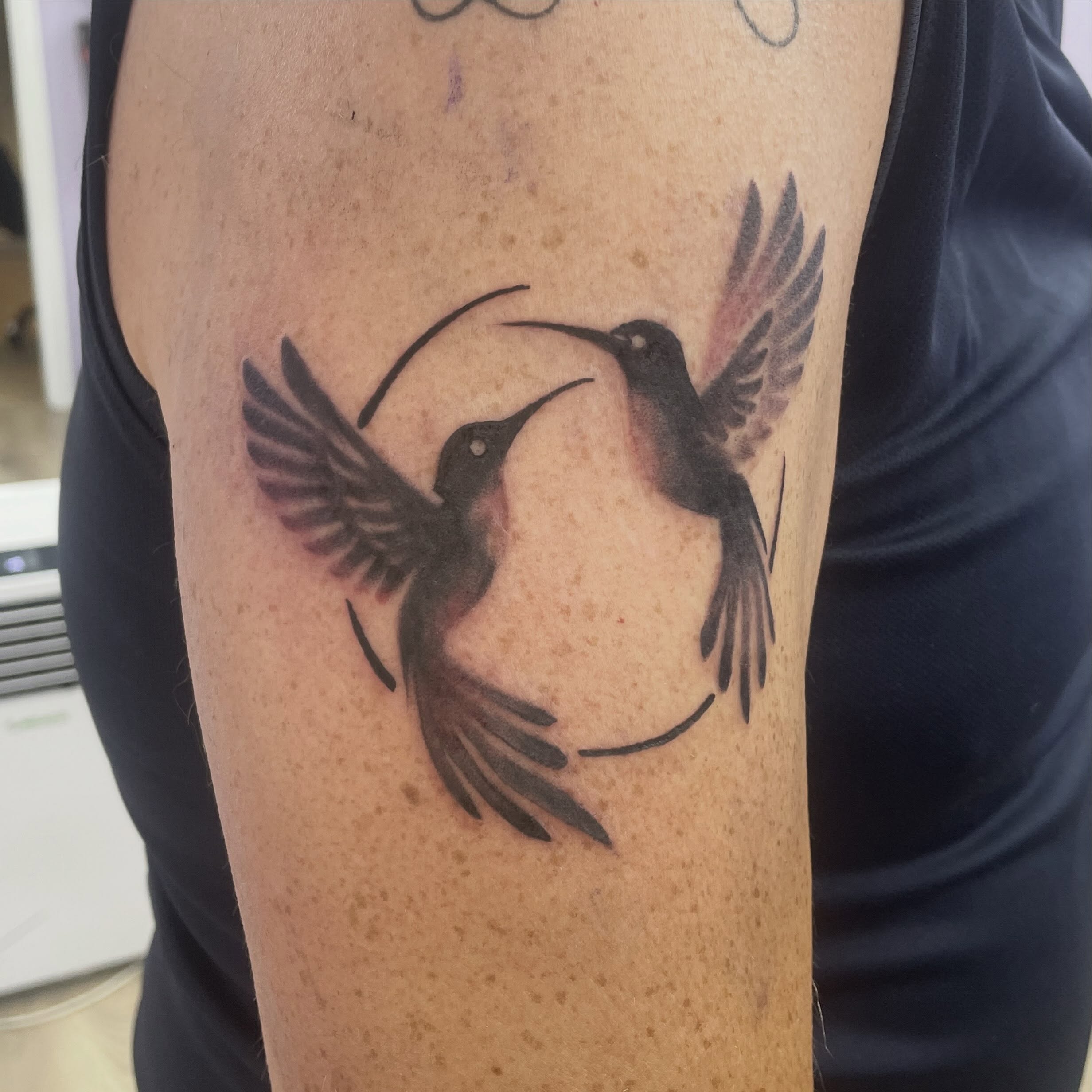 Hummingbirds realism tattoo on the forearm by elly, Oakham