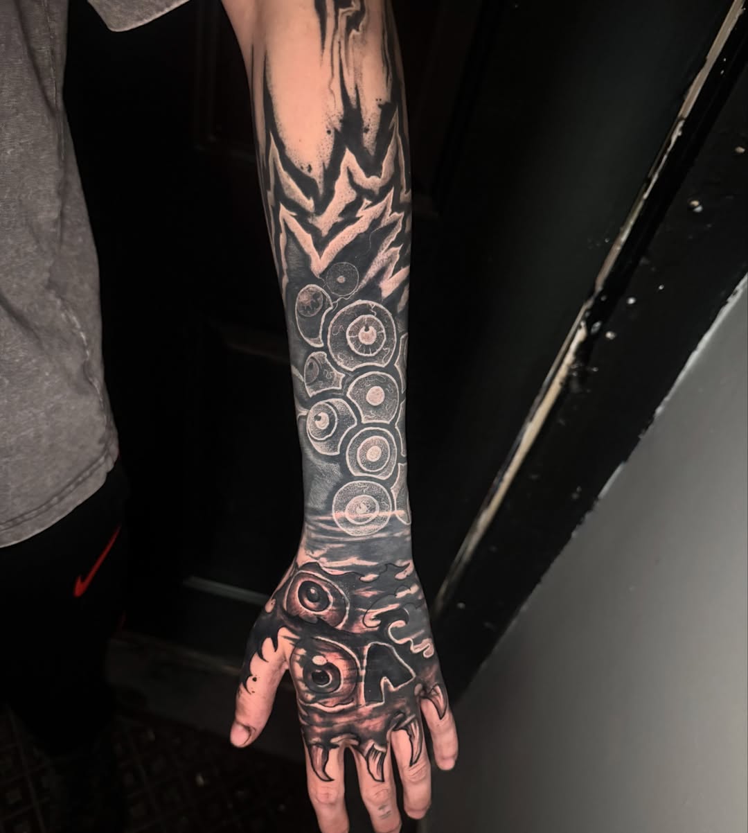Abstract pattern dotwork tattoo on the forearm by Alex Wheelock