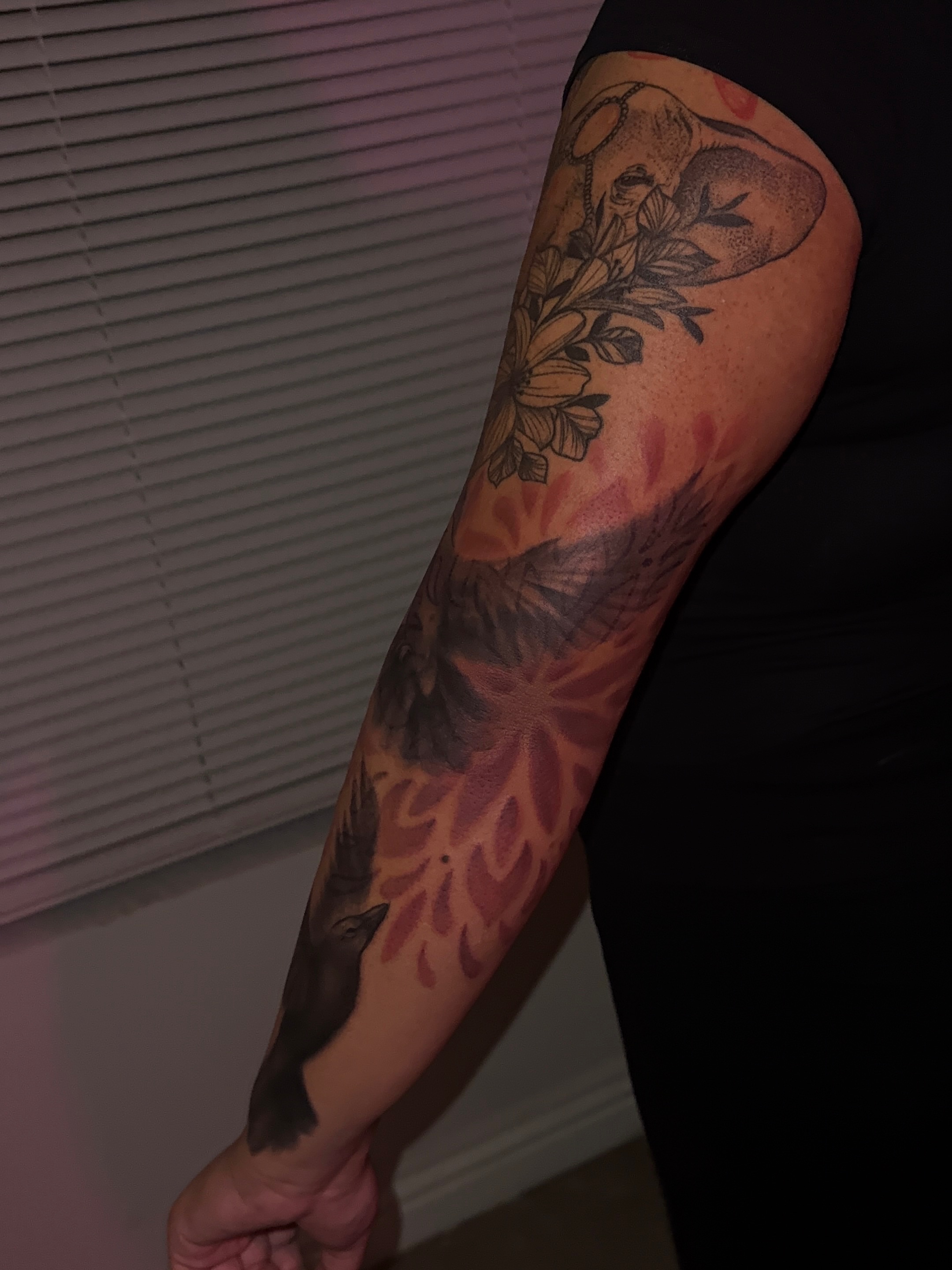 Floral and bird black and grey tattoo on the forearm by XoticTherapy, Las Vegas, Nevada