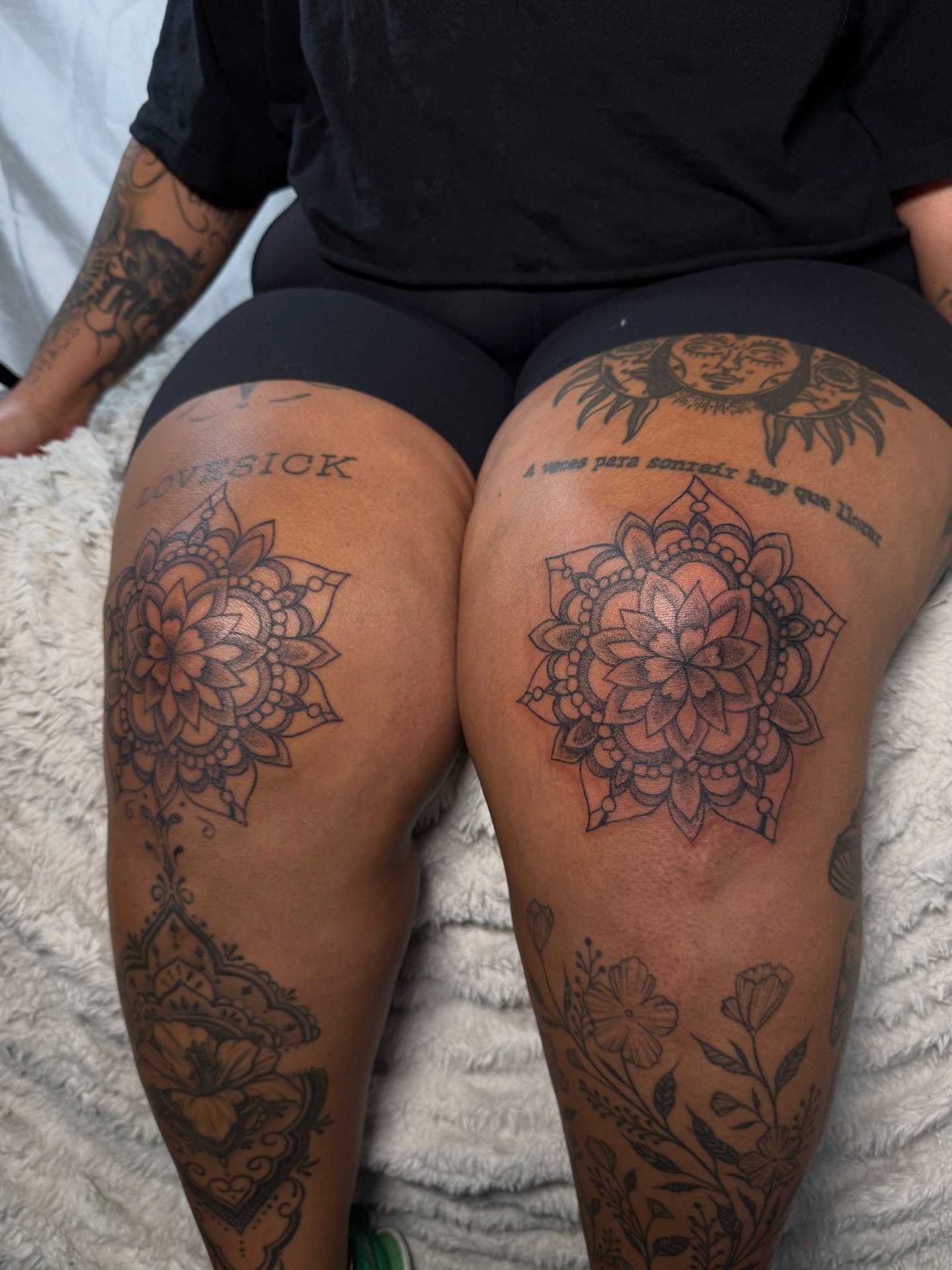 Mandala black and grey tattoo on the thigh by Victoria