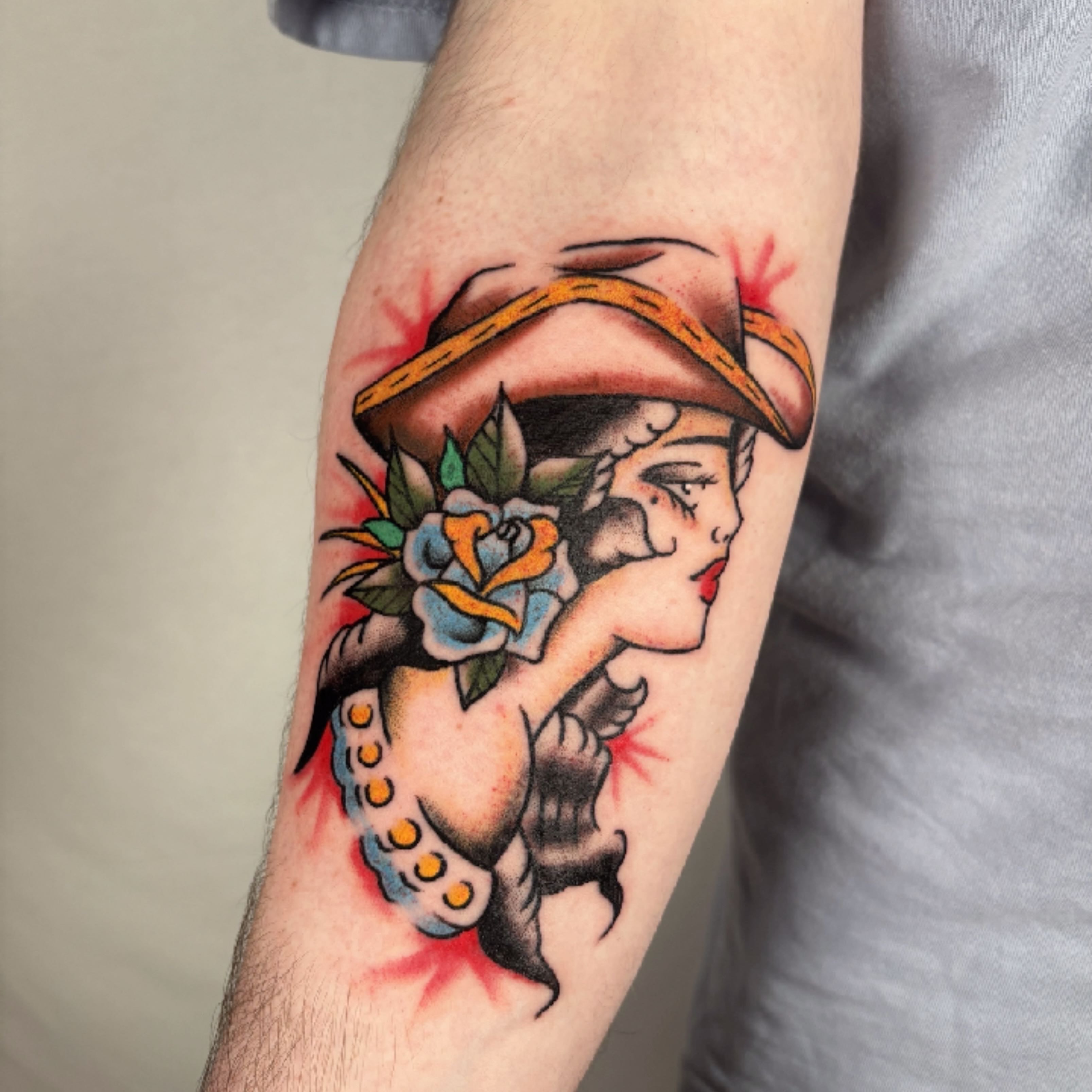 Woman with hat American traditional tattoo on the forearm by Davie Tattoos