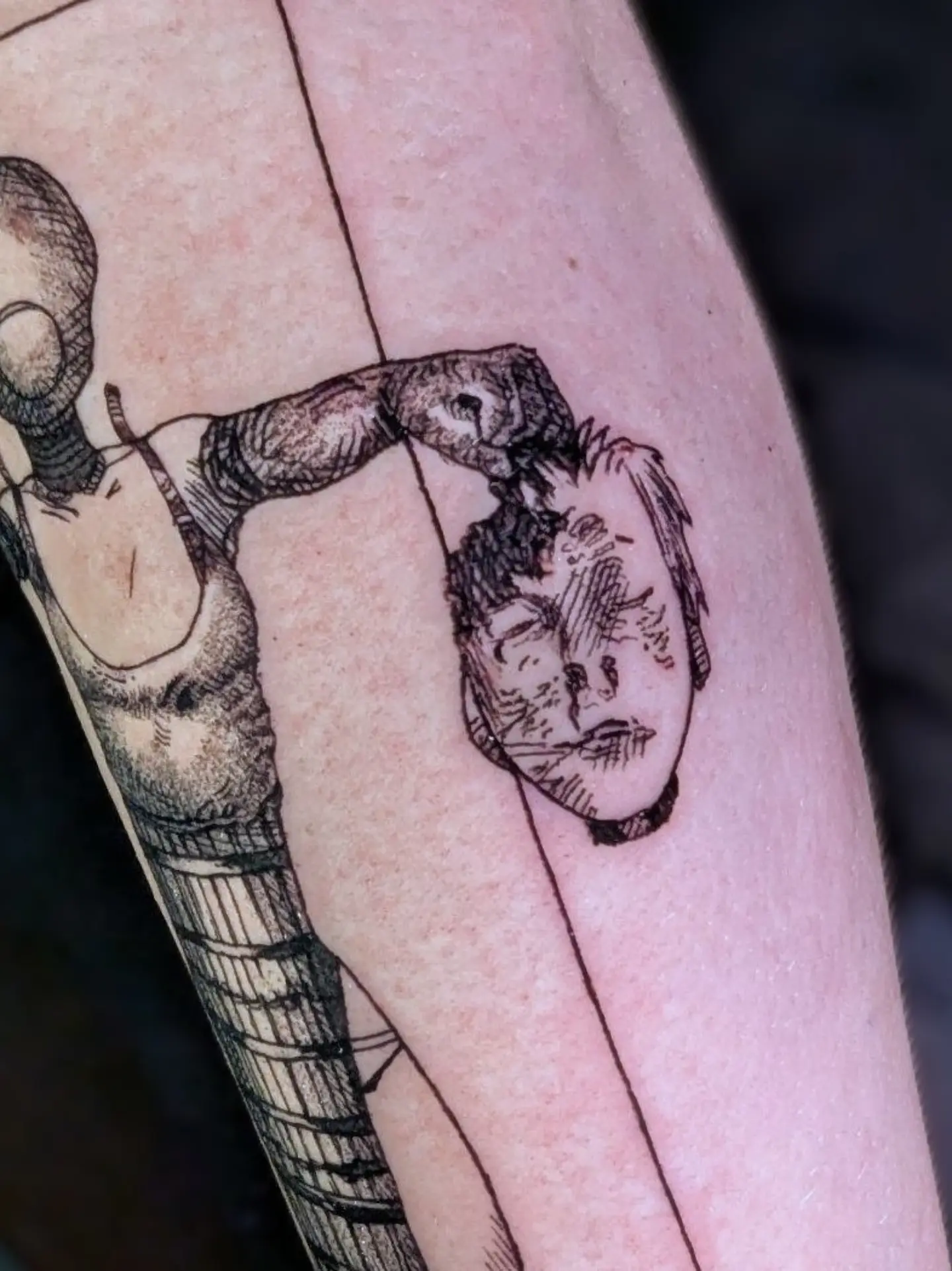 Robotic arm black and grey tattoo on the forearm by Seth Chitwood