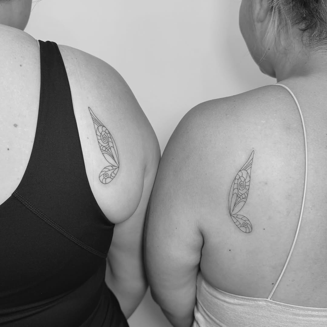 Wing geometric tattoo on the shoulder by Jessica, Cheektowaga, New York