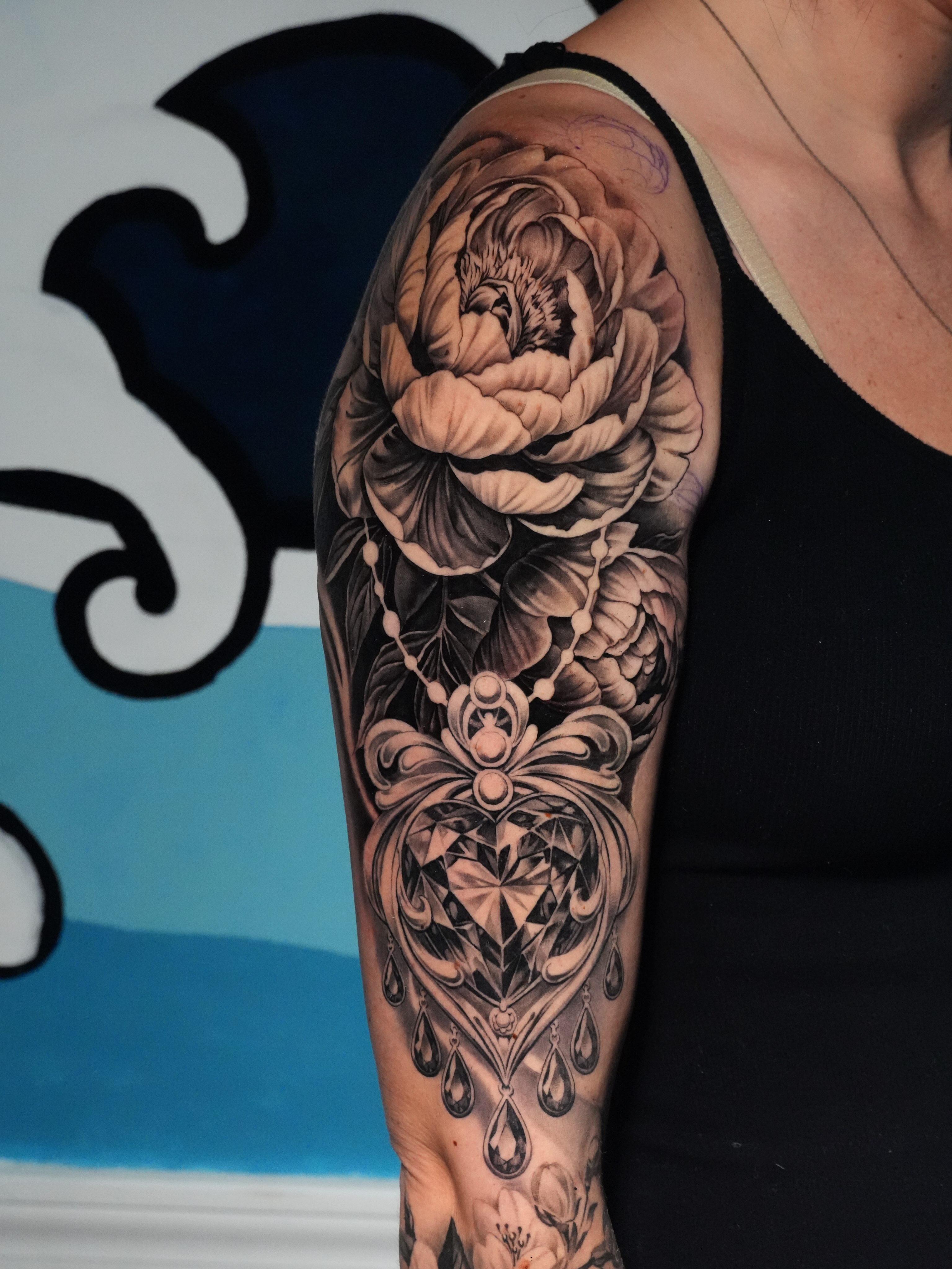 Tattoo by @aqua.ink_joe — black_and_grey, realism
