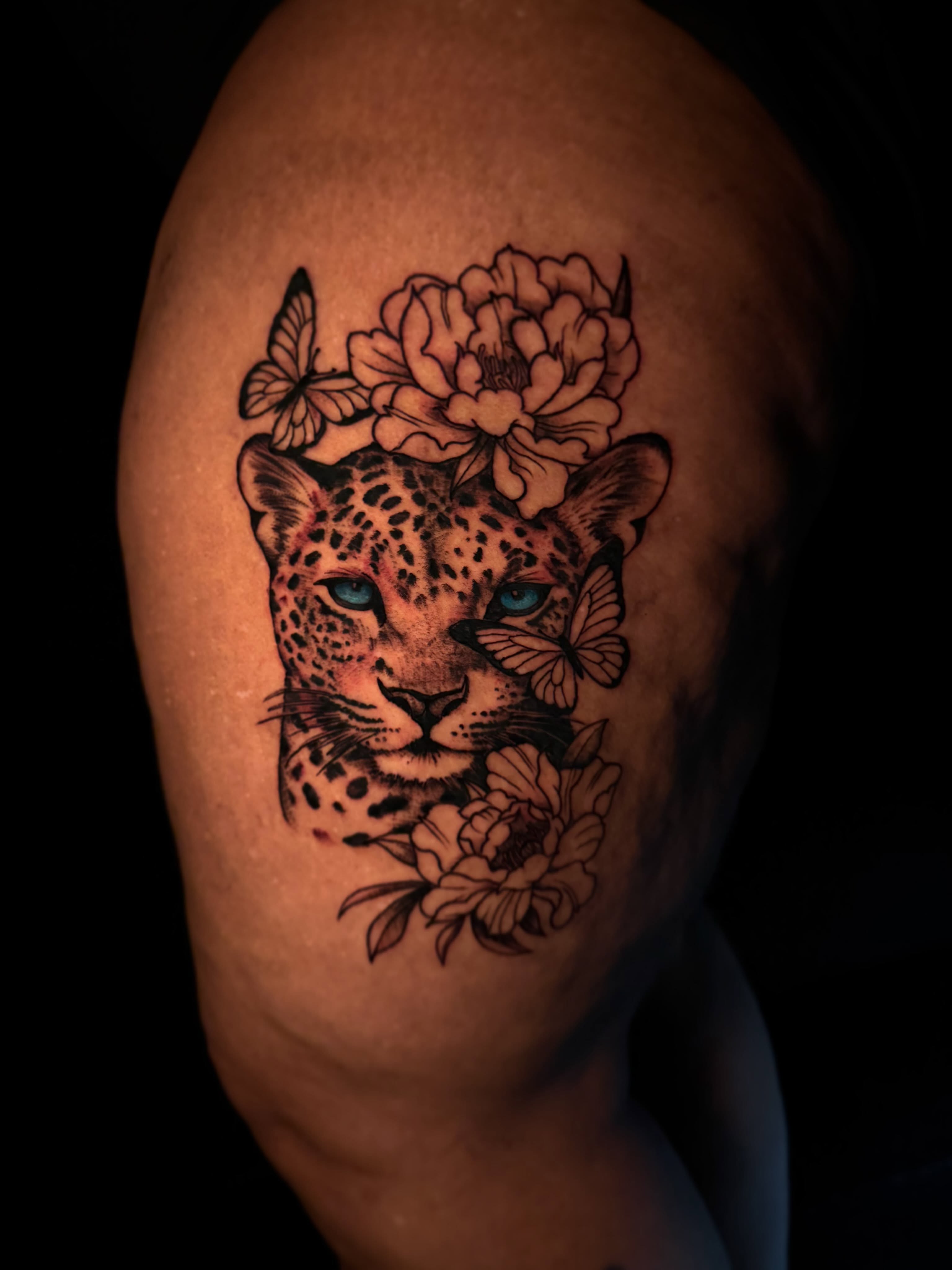 Leopard with flowers realism tattoo on the shoulder by π΅ππππππ¦π€