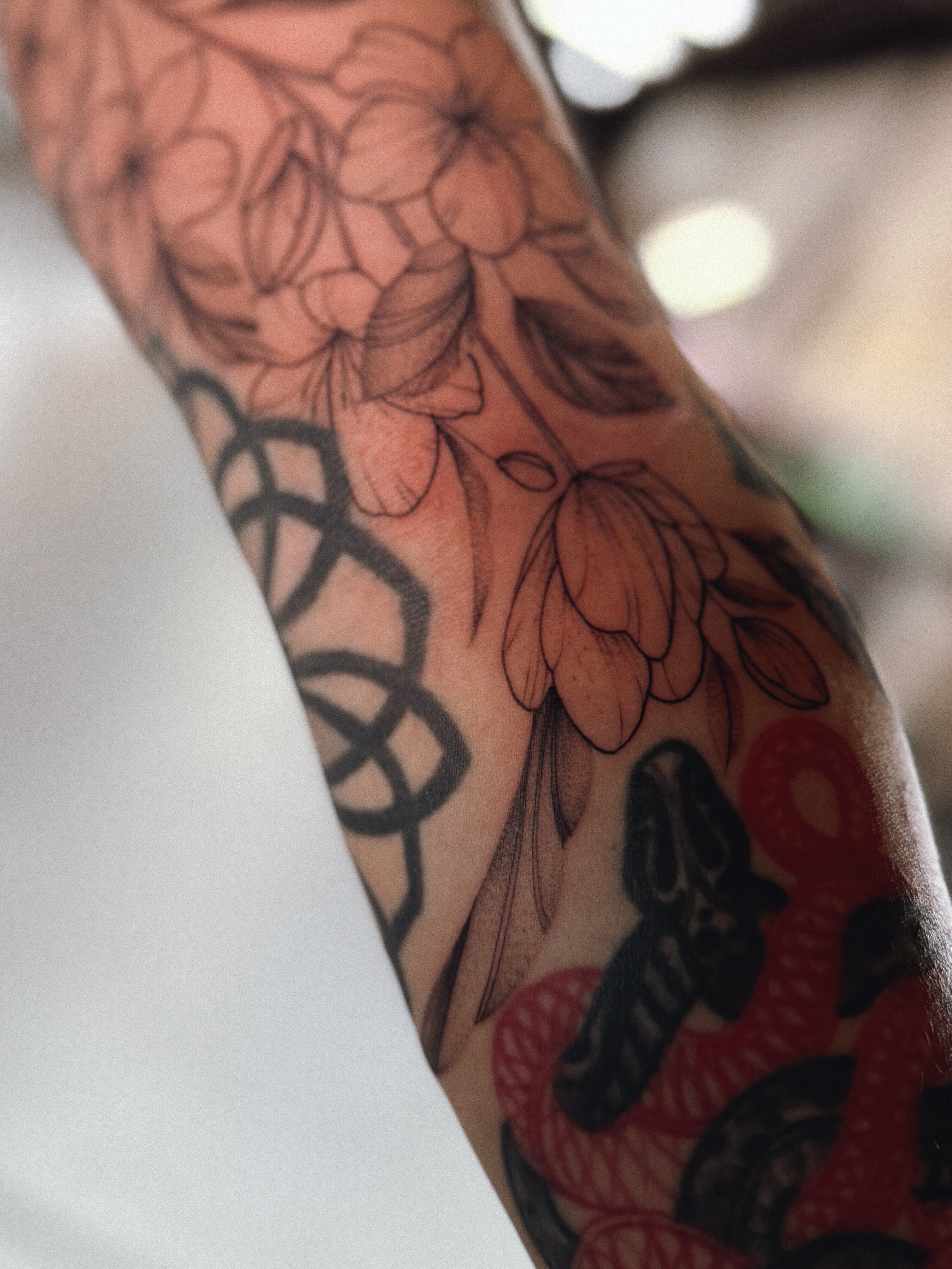 Floral arrangement black and grey tattoo on the forearm by a n a b e l l i n o, El Paso, Texas