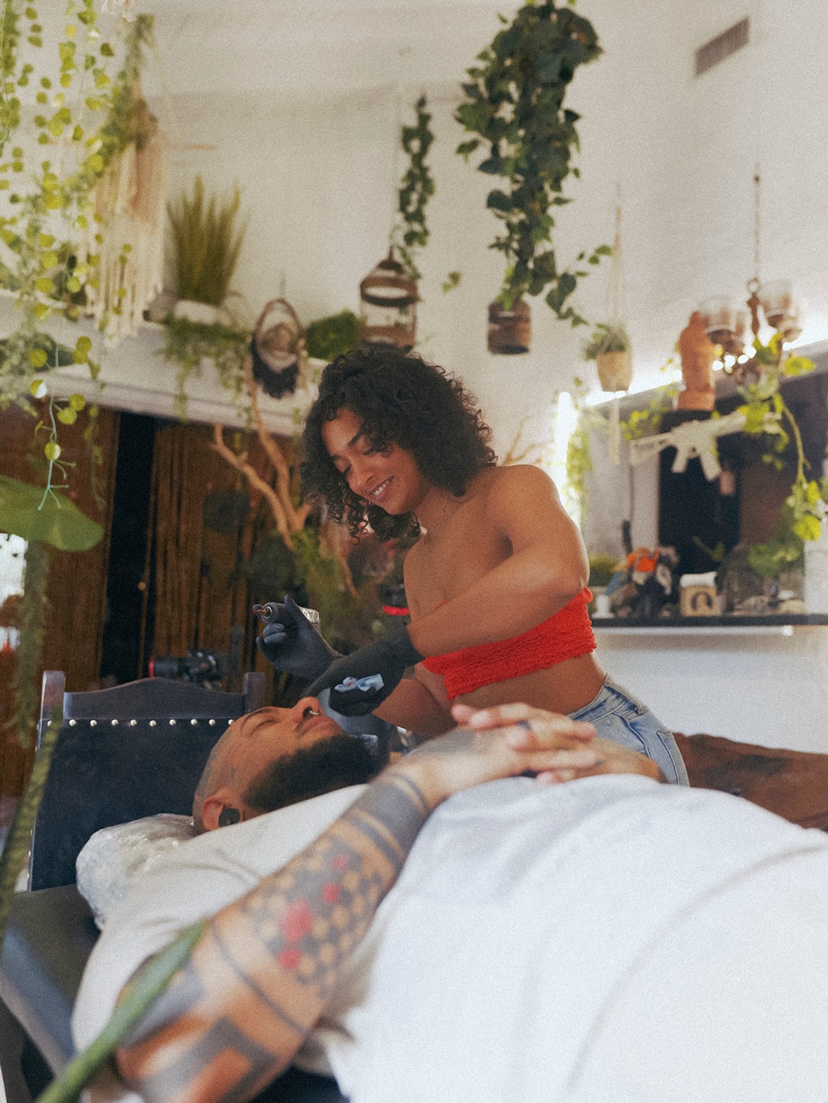 Tattoo artist American traditional tattoo on the upper arm by Lisa