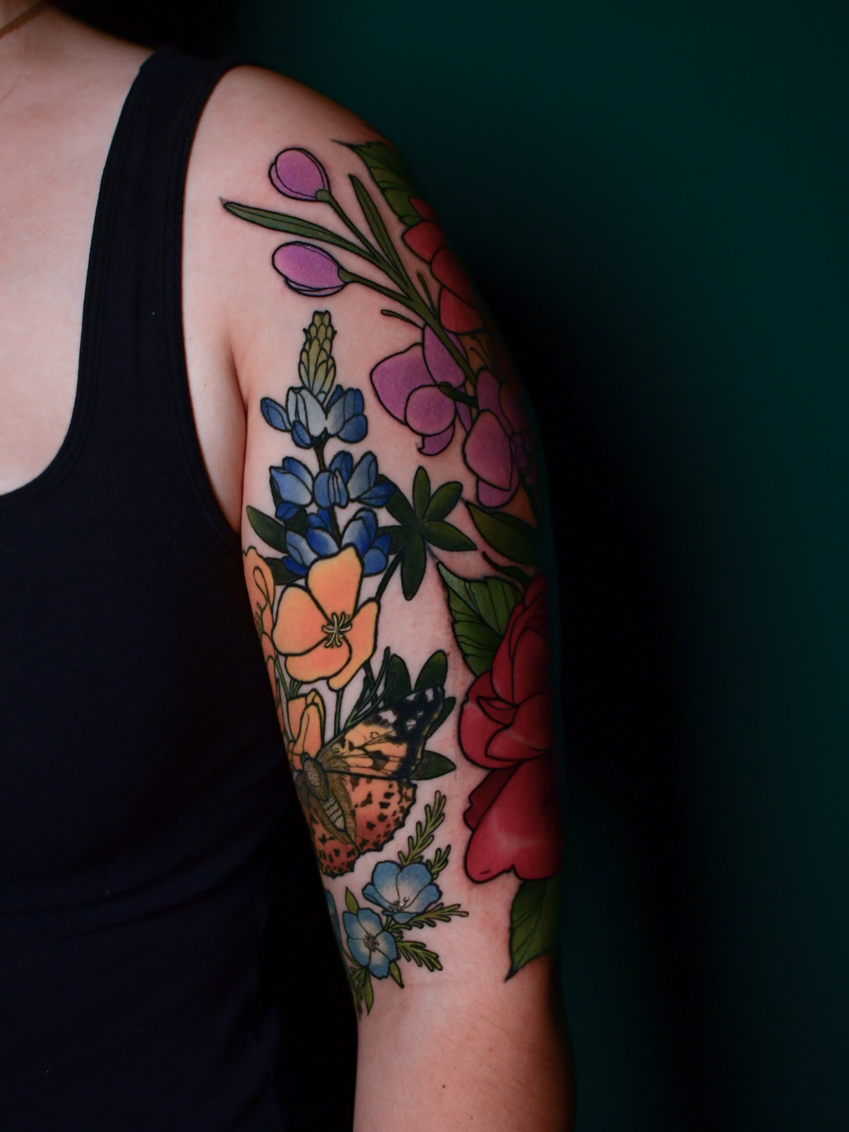 Floral bouquet new school tattoo on the upper arm by Karina πΌ Orange County Tattoo Artist