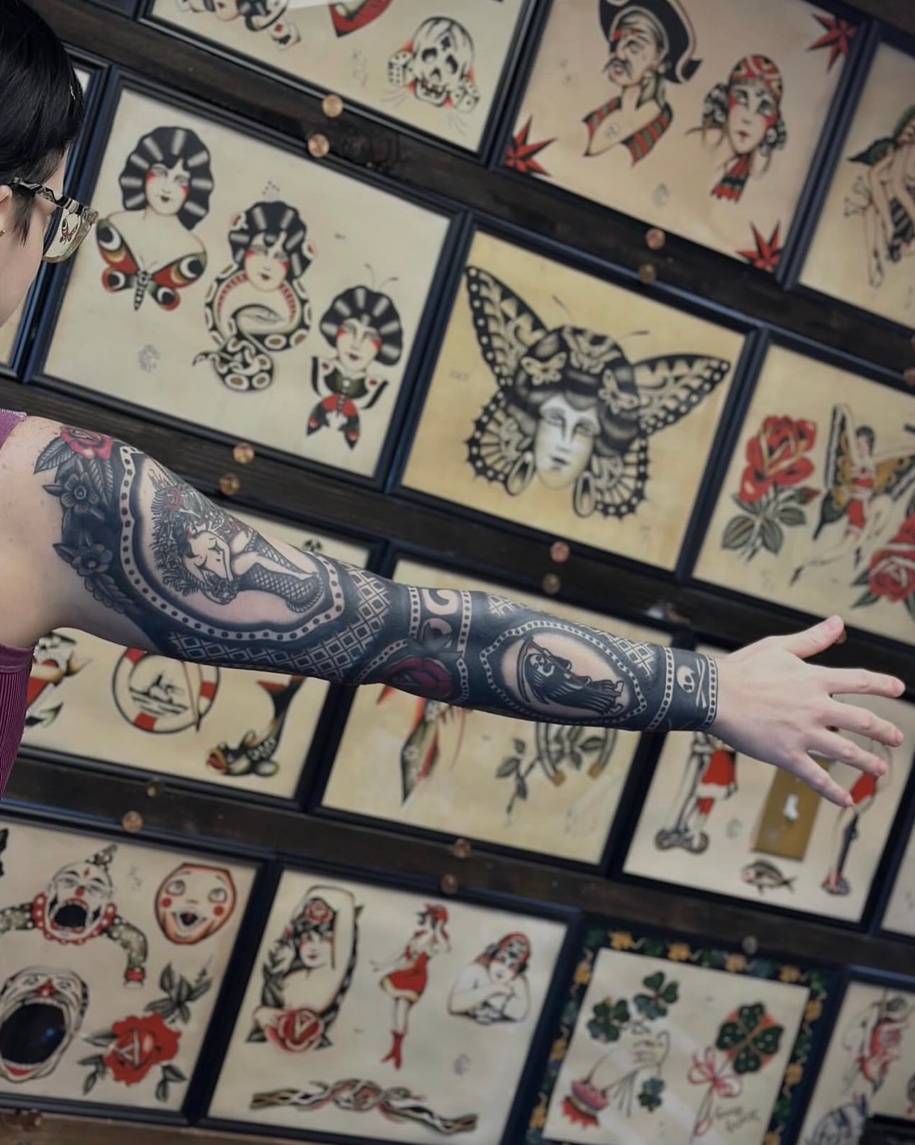 Woman with butterfly American traditional tattoo on the upper arm by @ryleecoyote, New York, New York