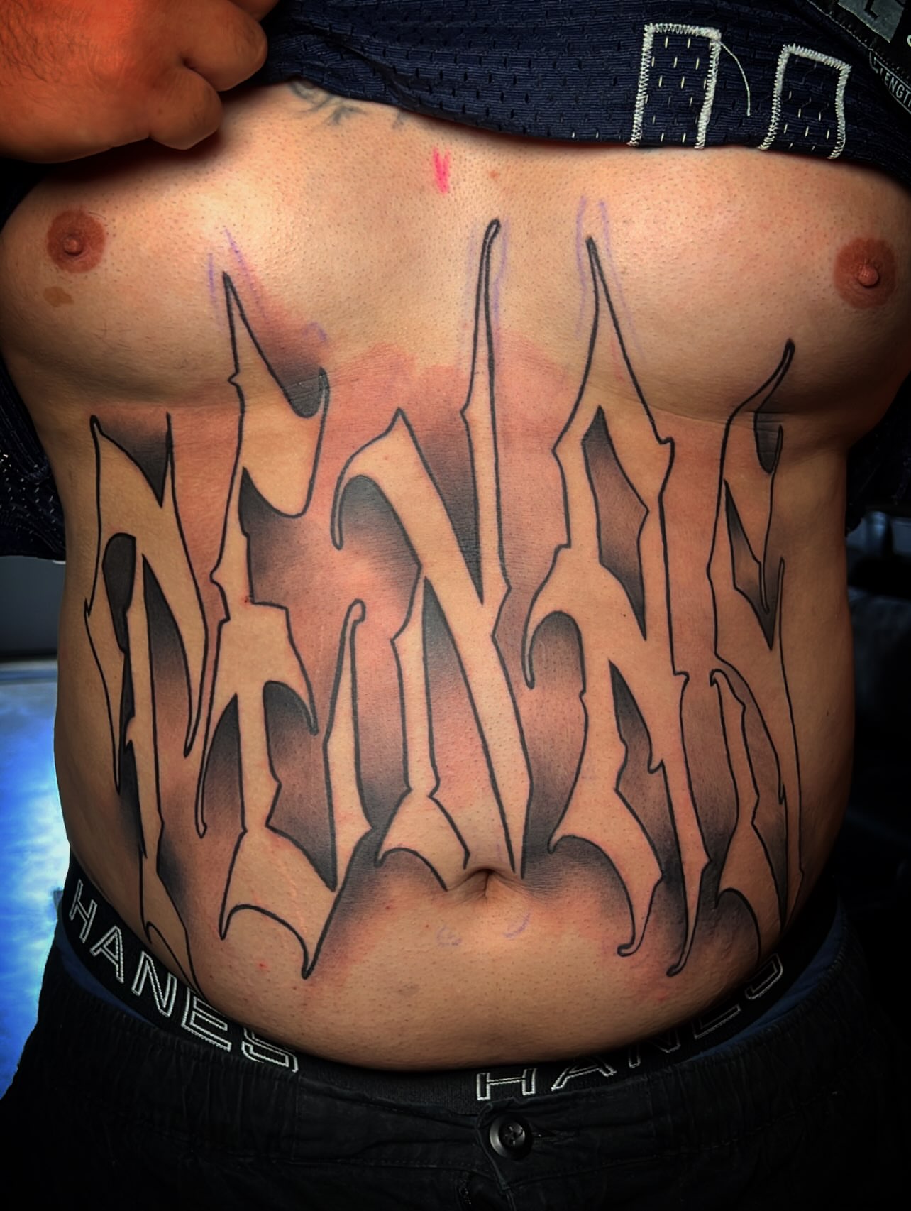 Lettering lettering script tattoo on the chest by Dallas tx tattoo artist ✝️