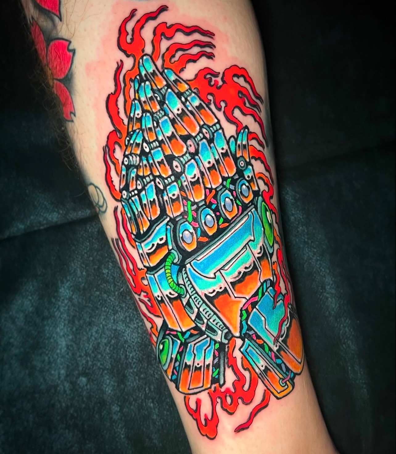 Robotic head geometric tattoo on the forearm by Jade Napier