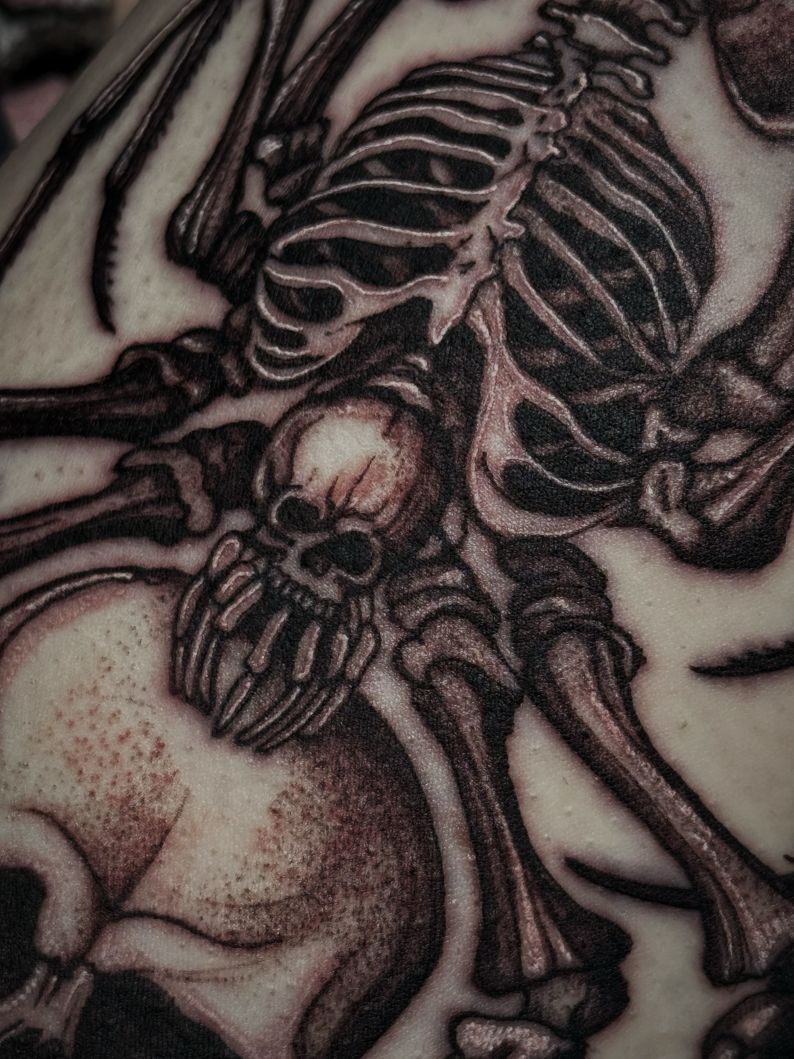 Skeleton black and grey tattoo on the torso by Kaylee Castleton, Tooele, Utah
