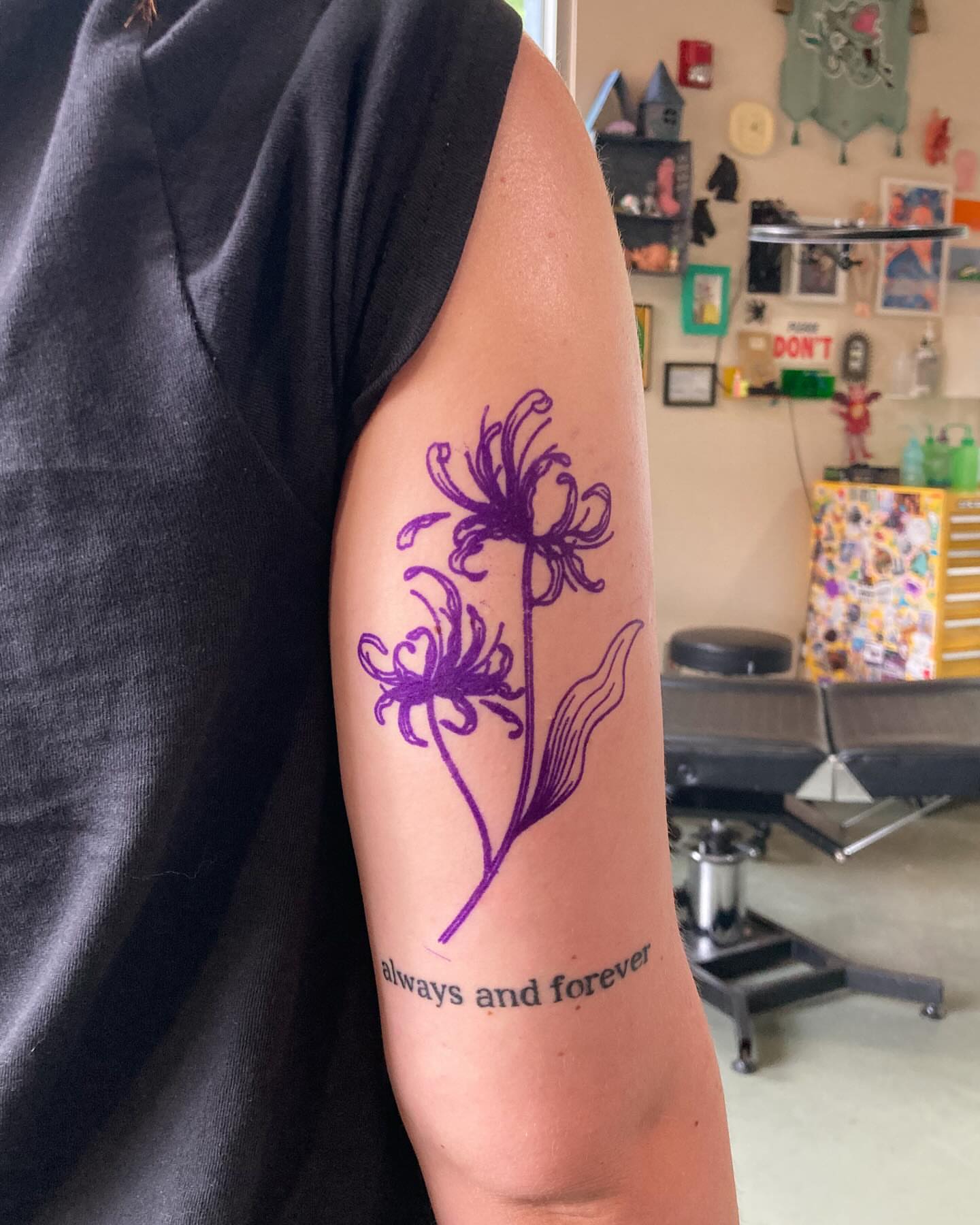Purple flowers minimalist tattoo on the forearm by james <3