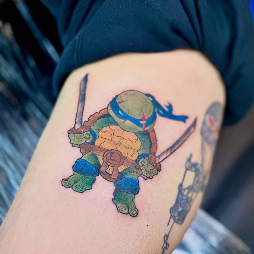 Teenage mutant ninja turtle new school tattoo on the forearm by Jamie Hall, Kansas City, Missouri