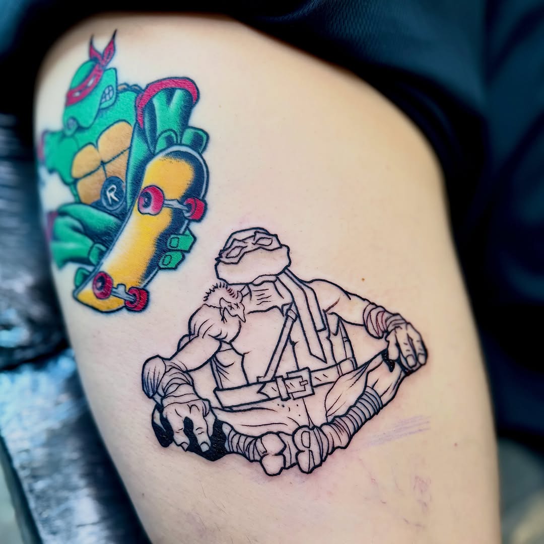 Skateboarding turtle American traditional tattoo on the thigh by Jamie Hall, Kansas City, Missouri