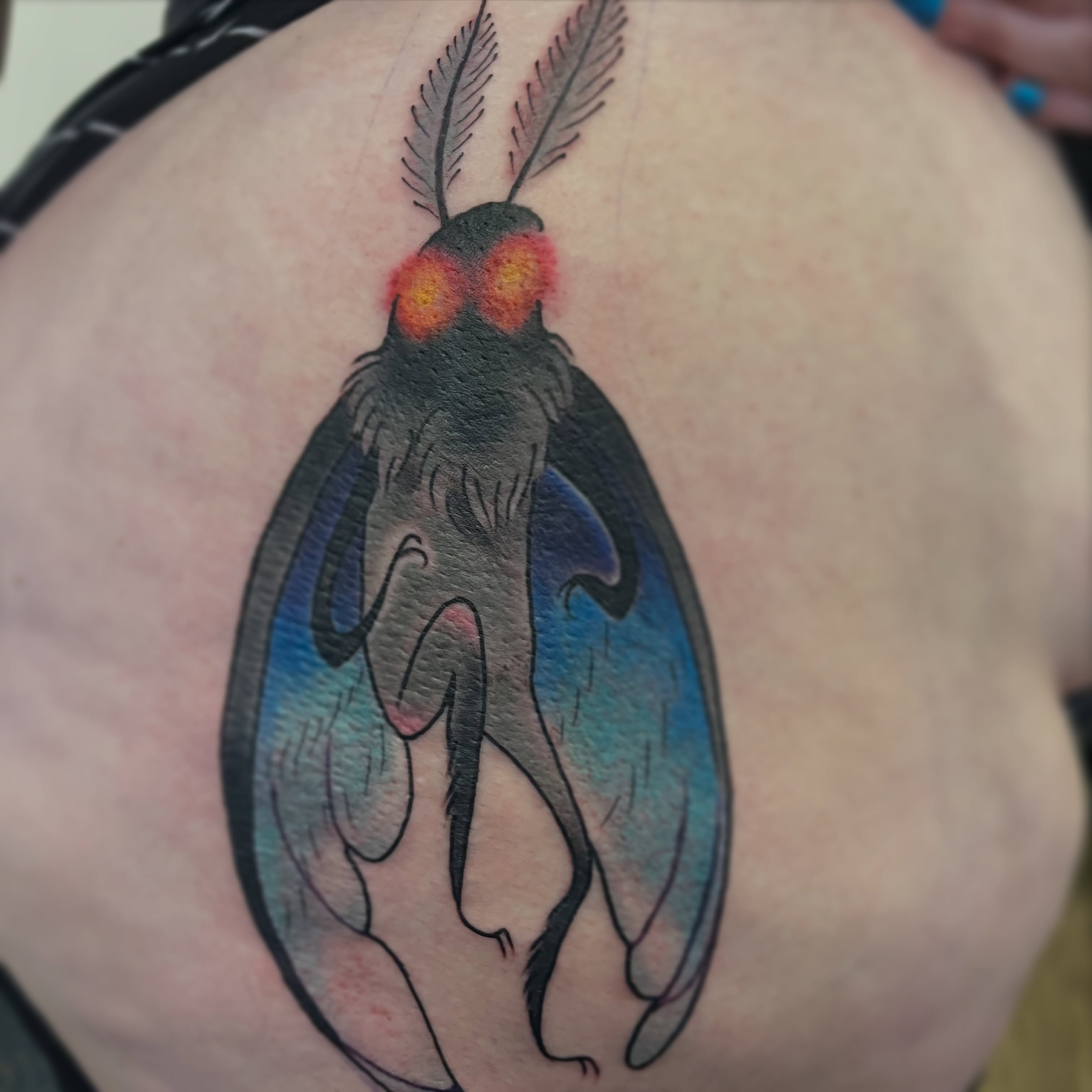 Moth American traditional tattoo on the thigh by Lacey B, Portland, Oregon