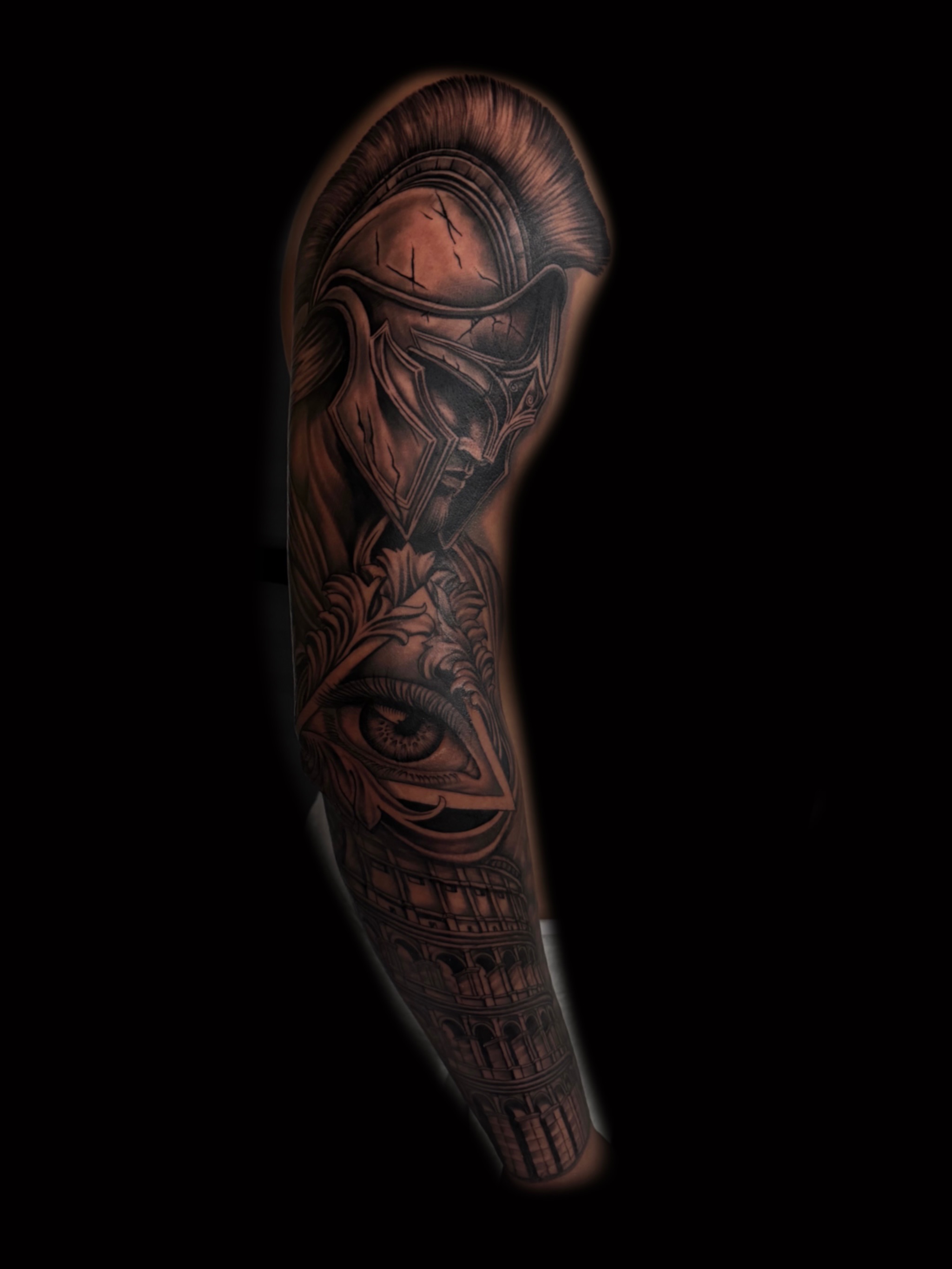 Helmeted warrior realism tattoo on the forearm by Alex