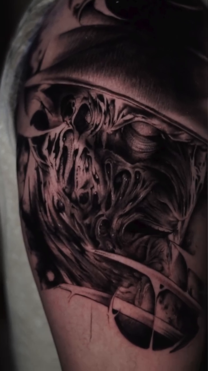 Freddy Krueger dark realism tattoo by Daniel Gonzalez