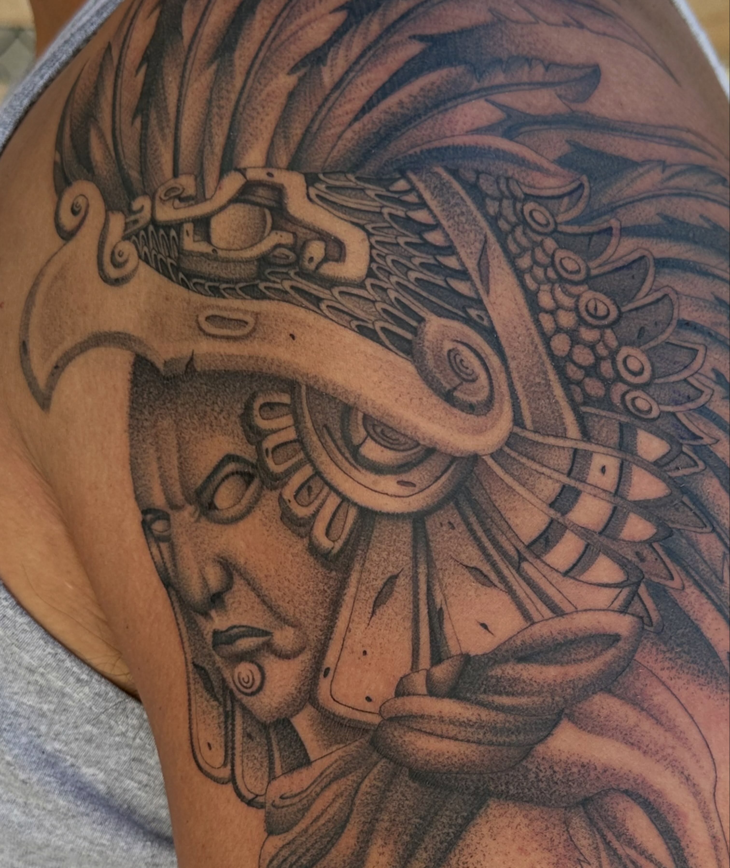 Maya warrior dotwork tattoo on the shoulder by San Diego Tattoo Artist