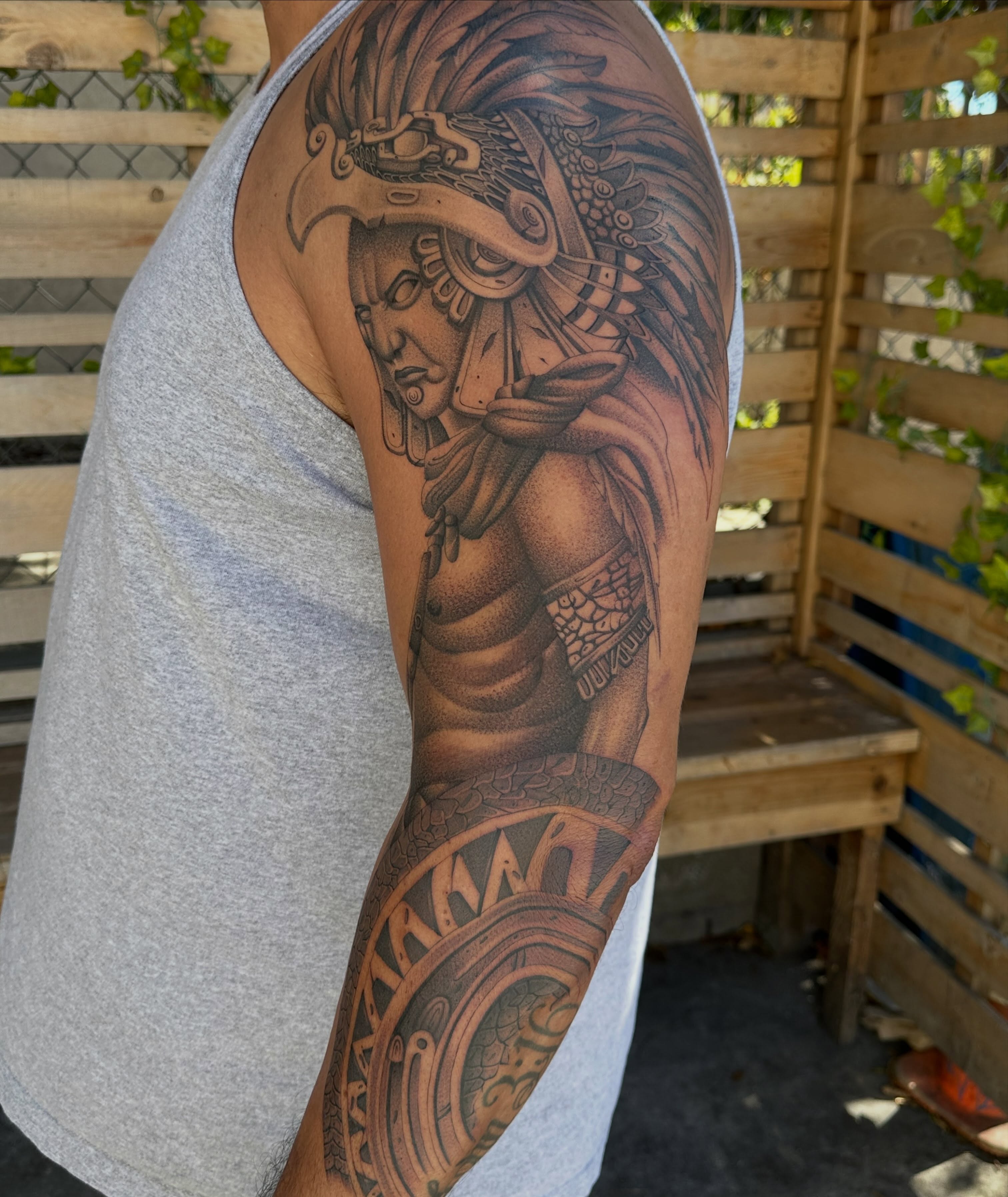Indian warrior black and grey tattoo on the upper arm by San Diego Tattoo Artist