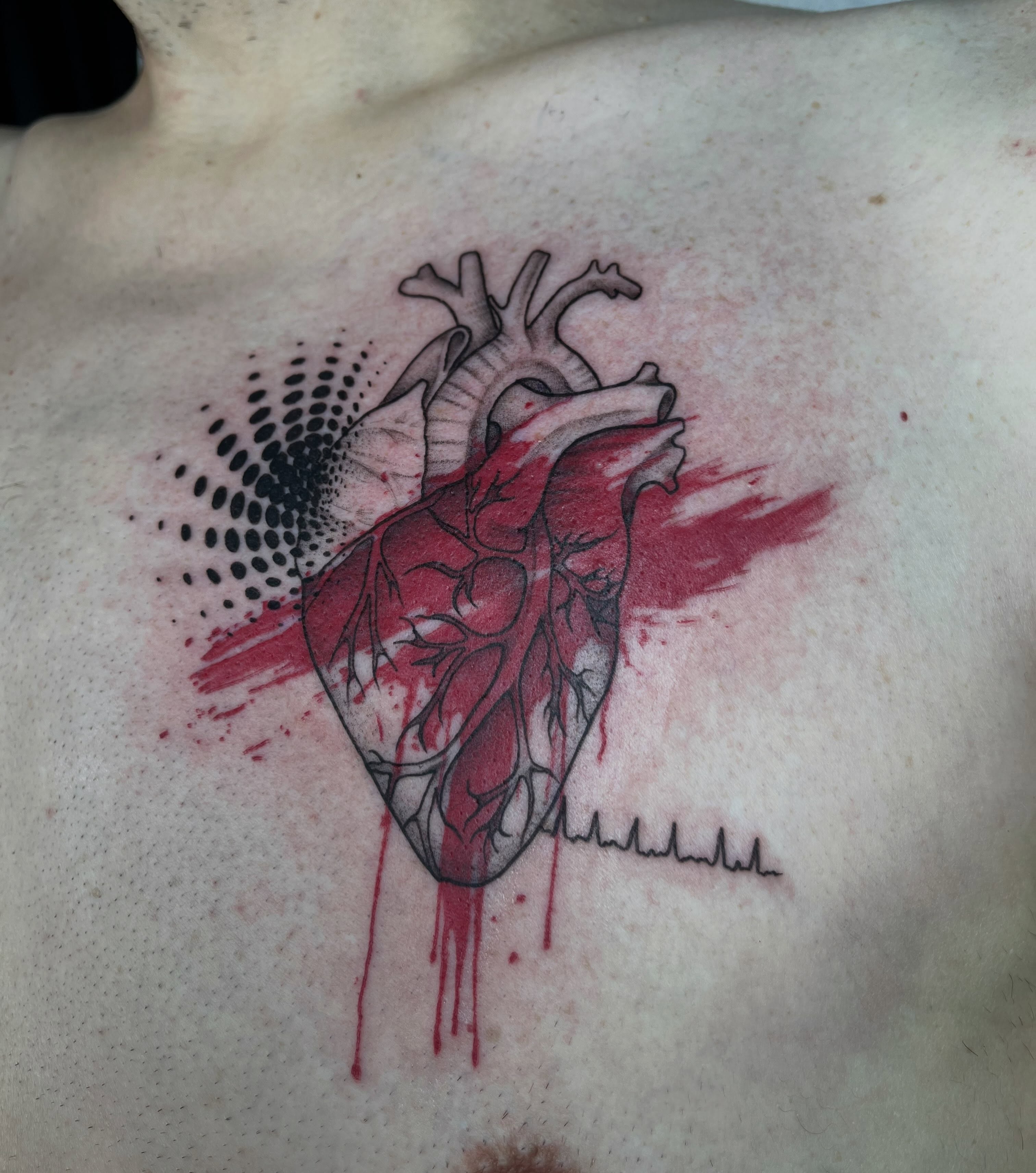 Anatomical heart dotwork tattoo on the chest by Ty’s Tattoos