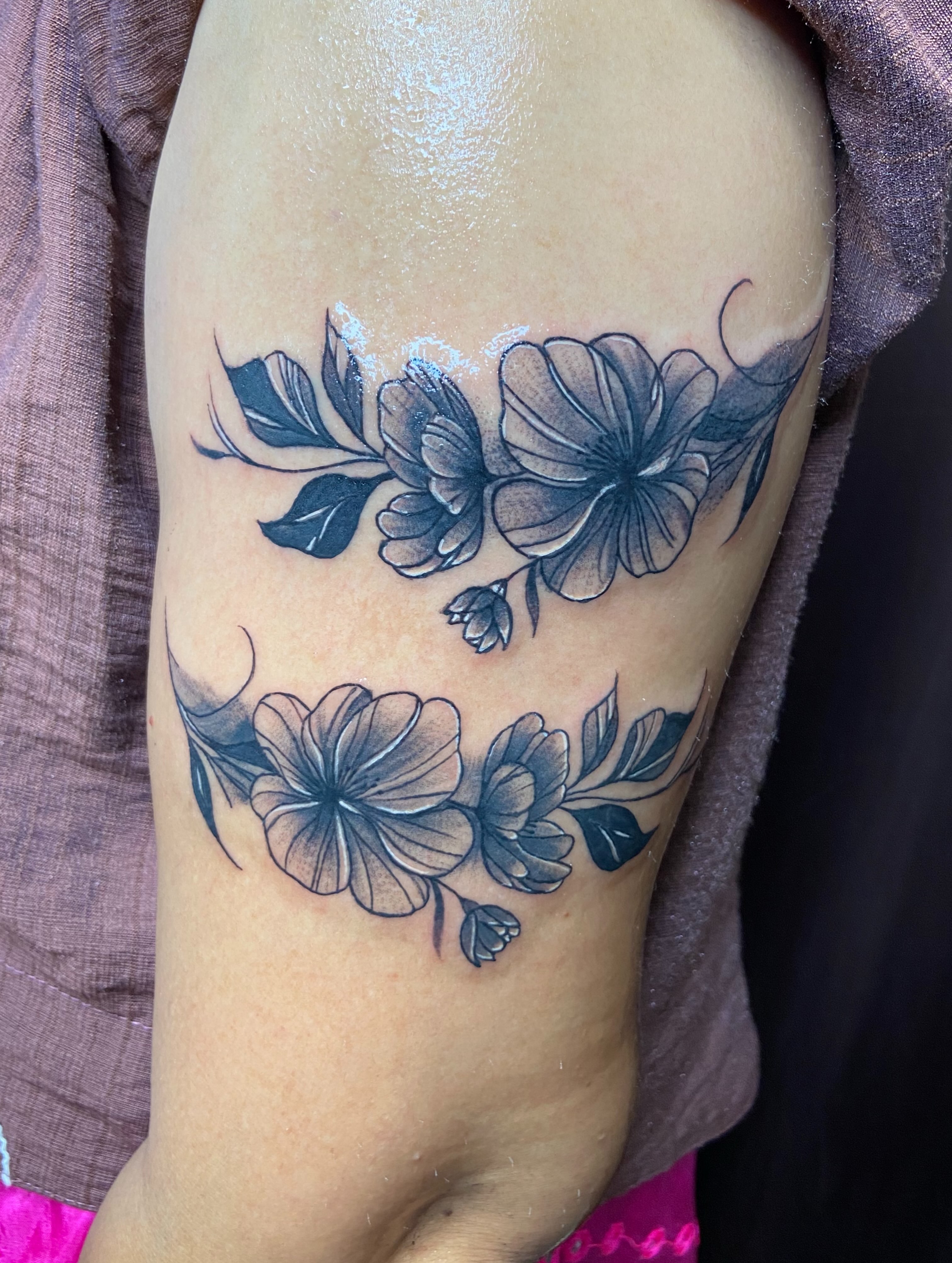 Floral arrangement black and grey tattoo on the forearm by VR tattoo Studio