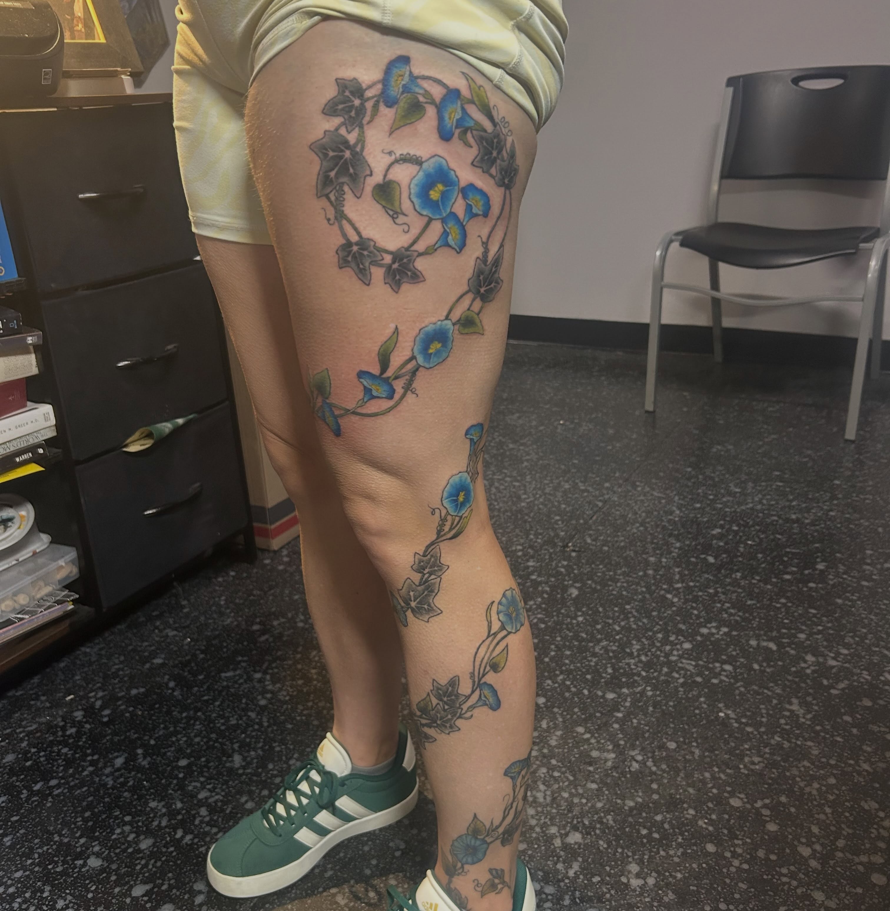 Morning glory vine realism tattoo on the thigh by Jamie Winn