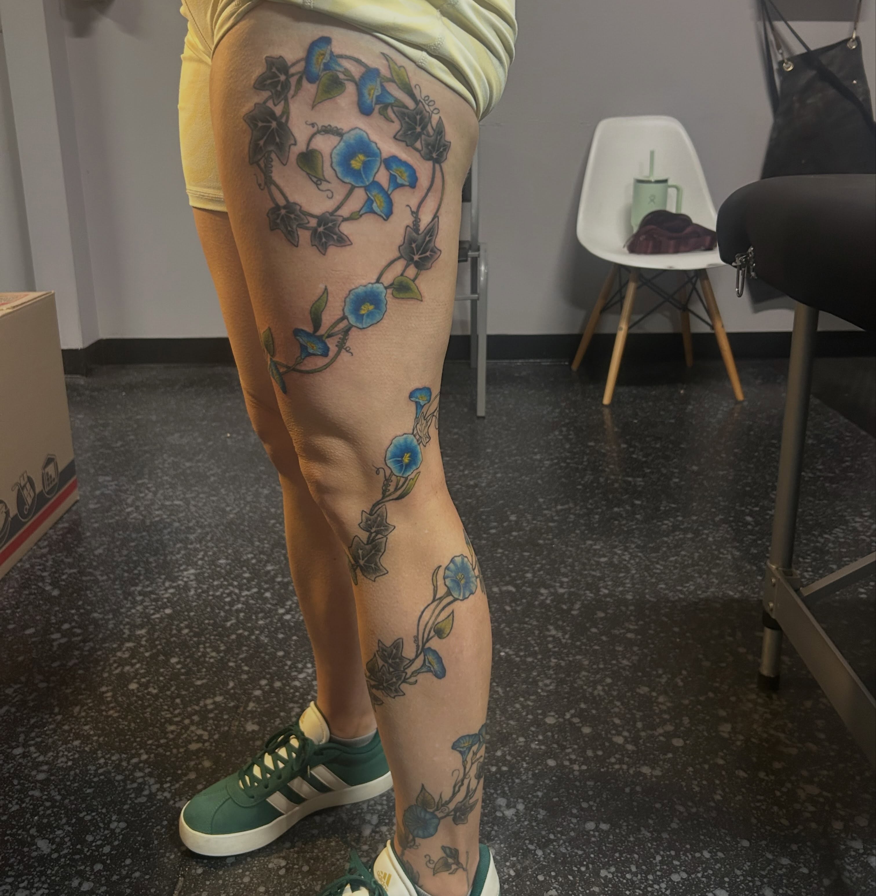 Morning glory vine dotwork tattoo on the thigh by Jamie Winn
