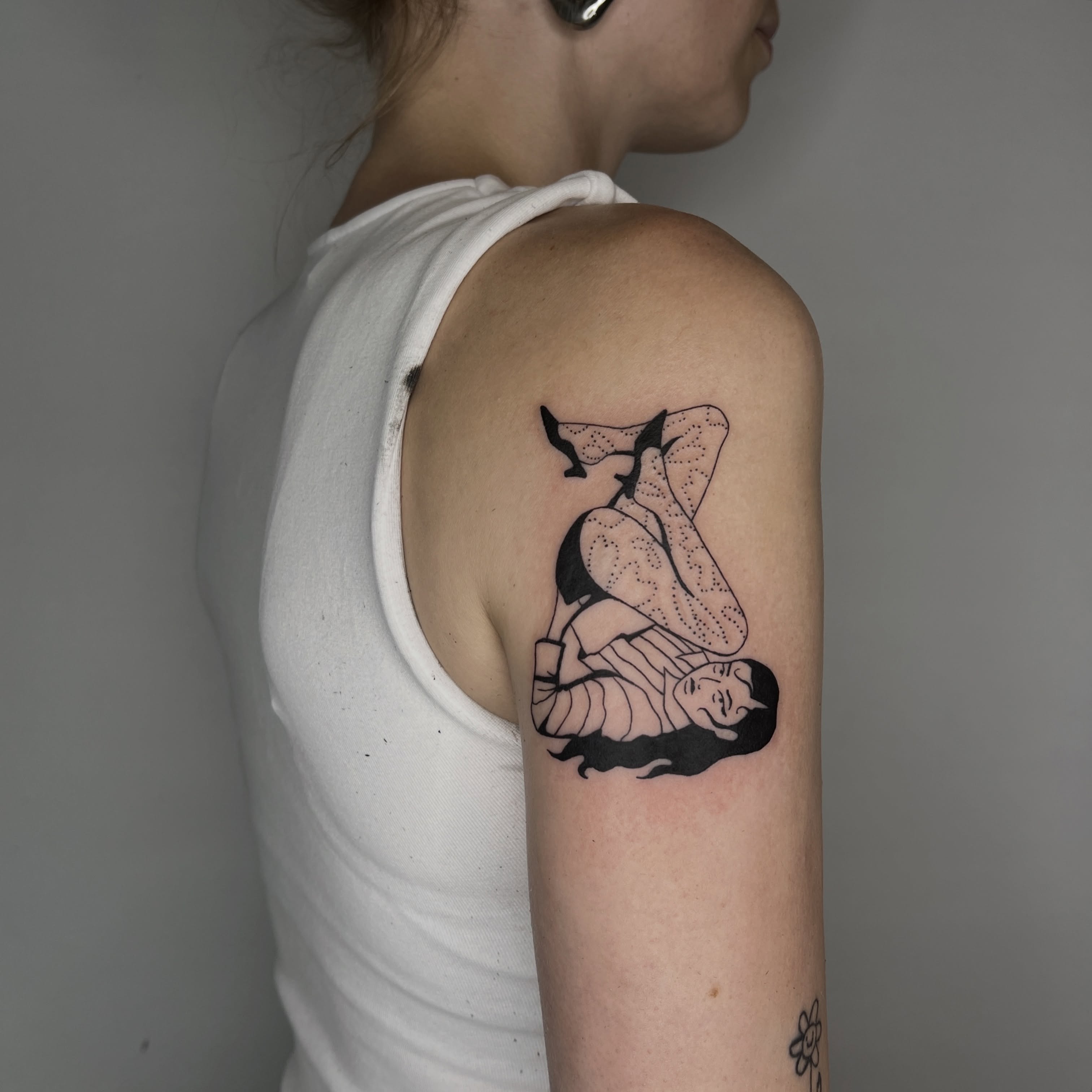 Woman in lingerie dotwork tattoo on the upper arm by Elleree (LRE)