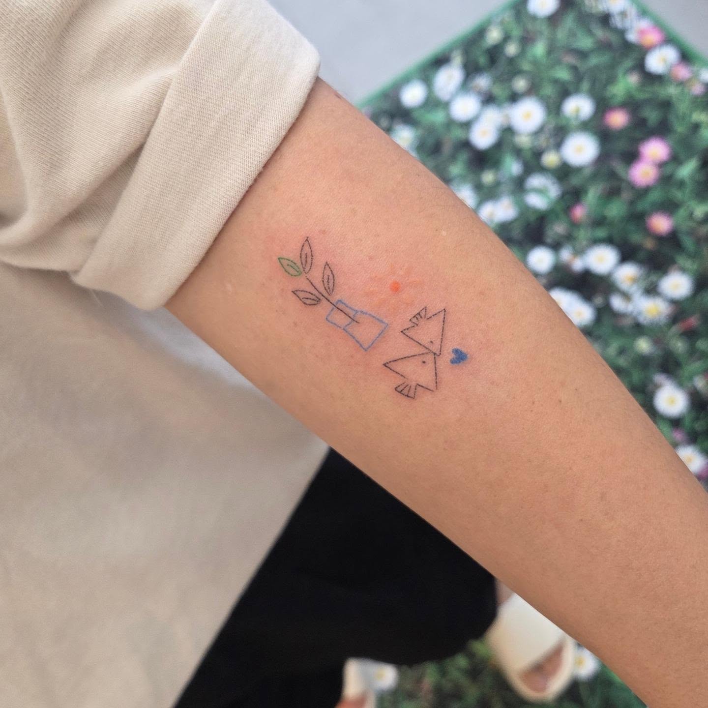 Tattoo by @nurimoon_tattoo — minimalist