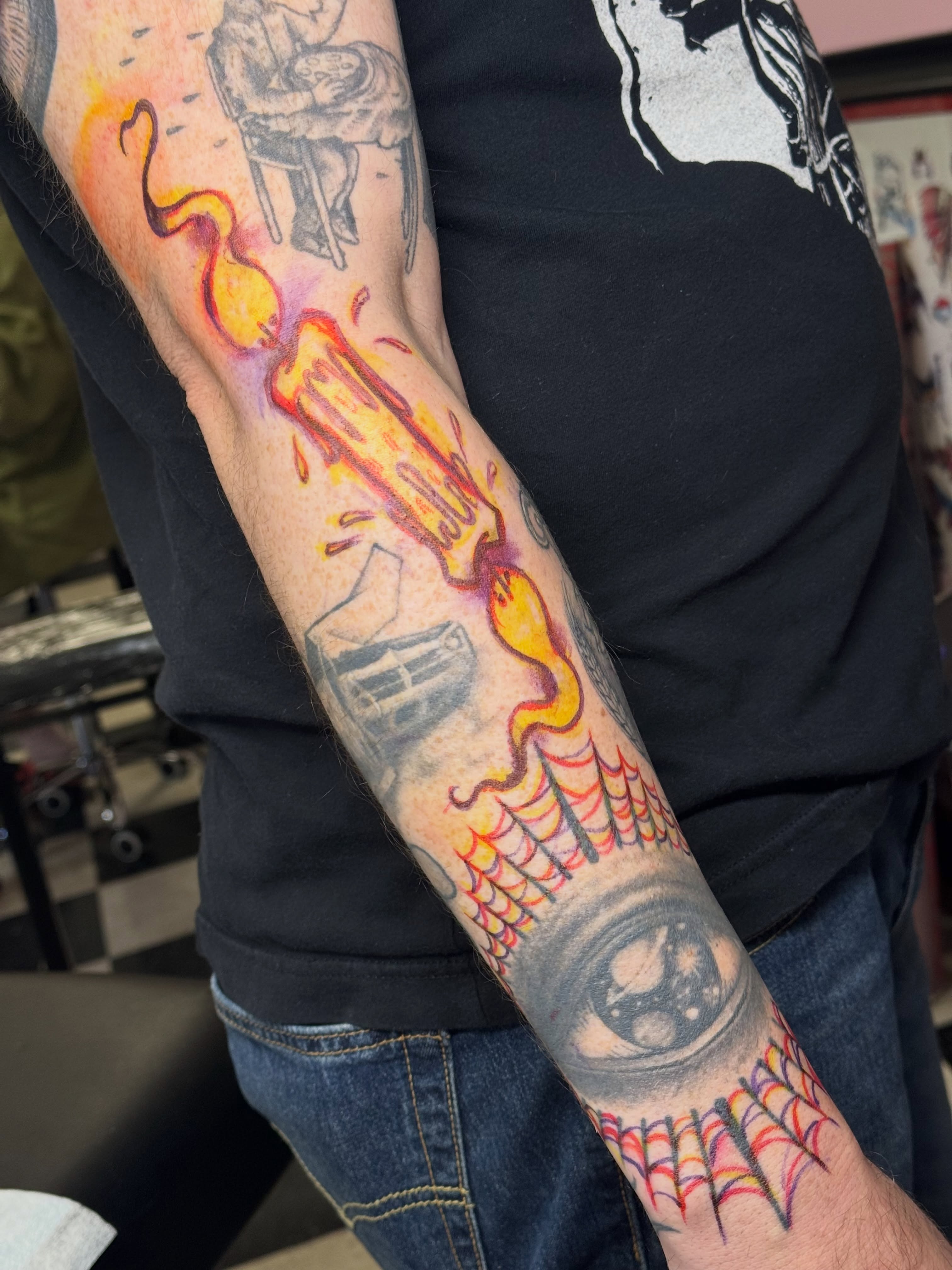 Flaming hot dog new school tattoo on the forearm by Mitch McGarry