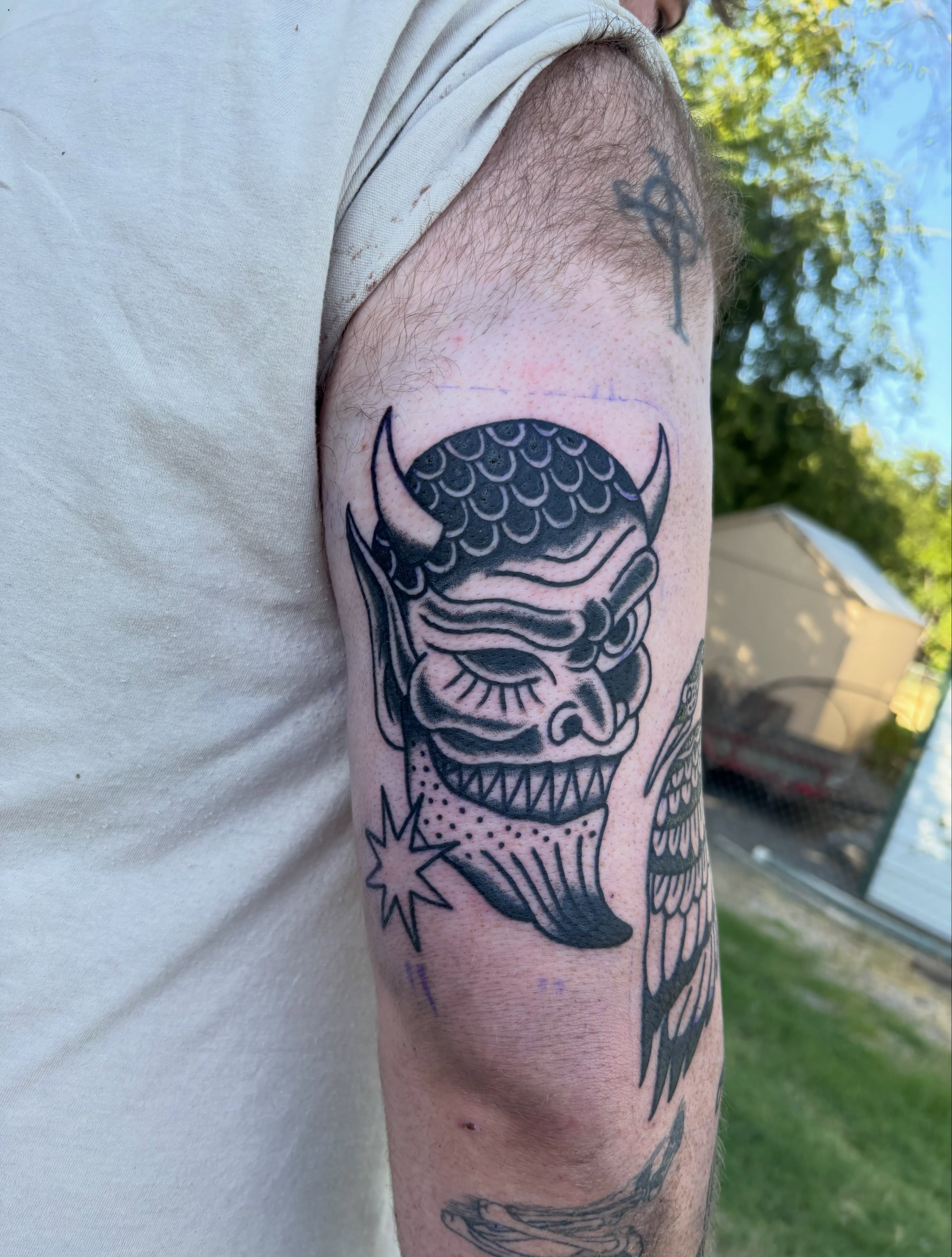 Demon mask japanese irezumi tattoo on the forearm by Ethan Ellis, Dallas, Texas