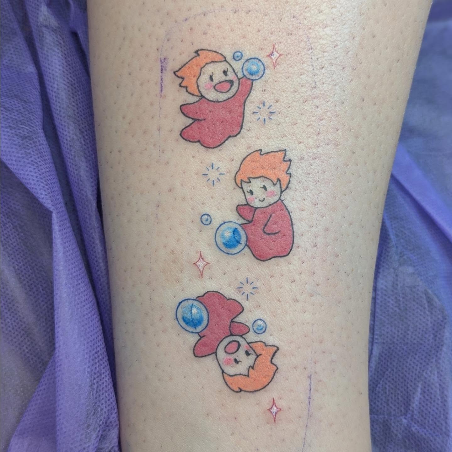 Child with bubbles dotwork tattoo on the forearm by Spencer Jennings, Westland, Michigan