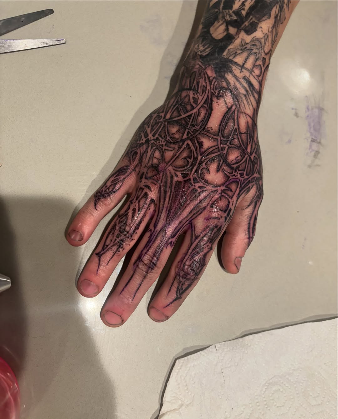 Intricate hand design geometric tattoo on the hand by @miffythereaper