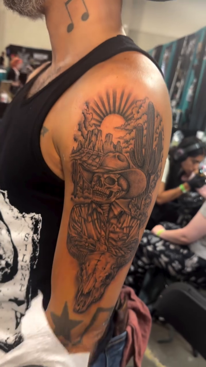 Skull with roses and sun realism tattoo by Myles Manuel Lopez, Phoenix, Arizona