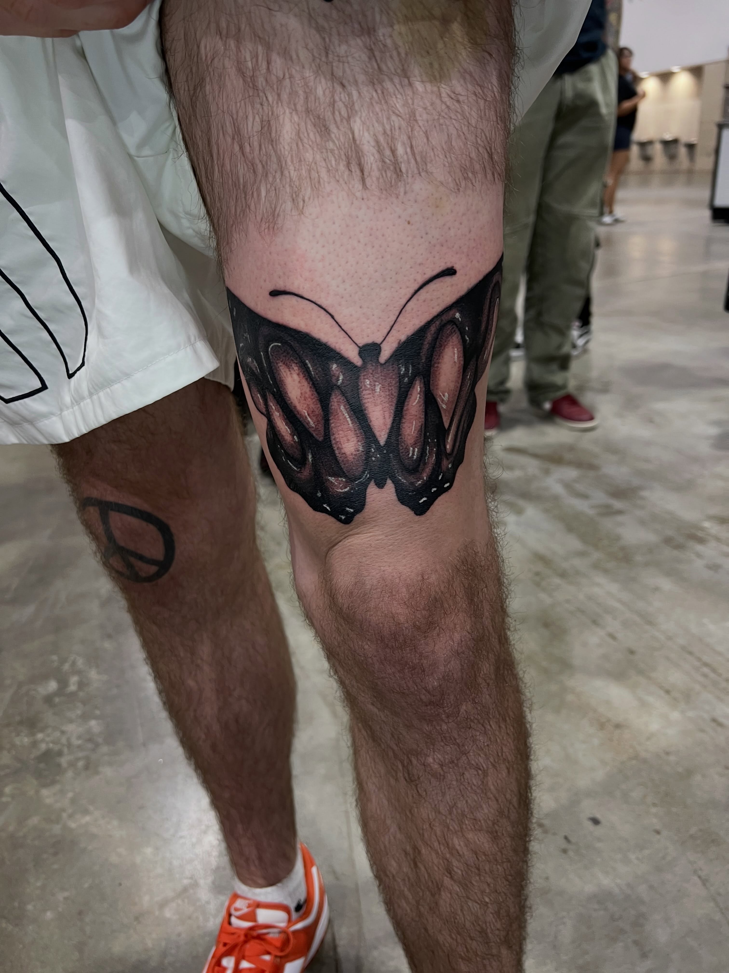 Butterfly realism tattoo on the thigh by Daphne Landry